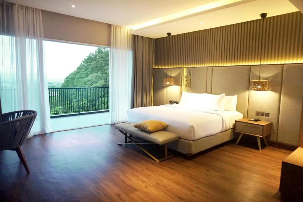 Bed in The Balcone Suites & Resort