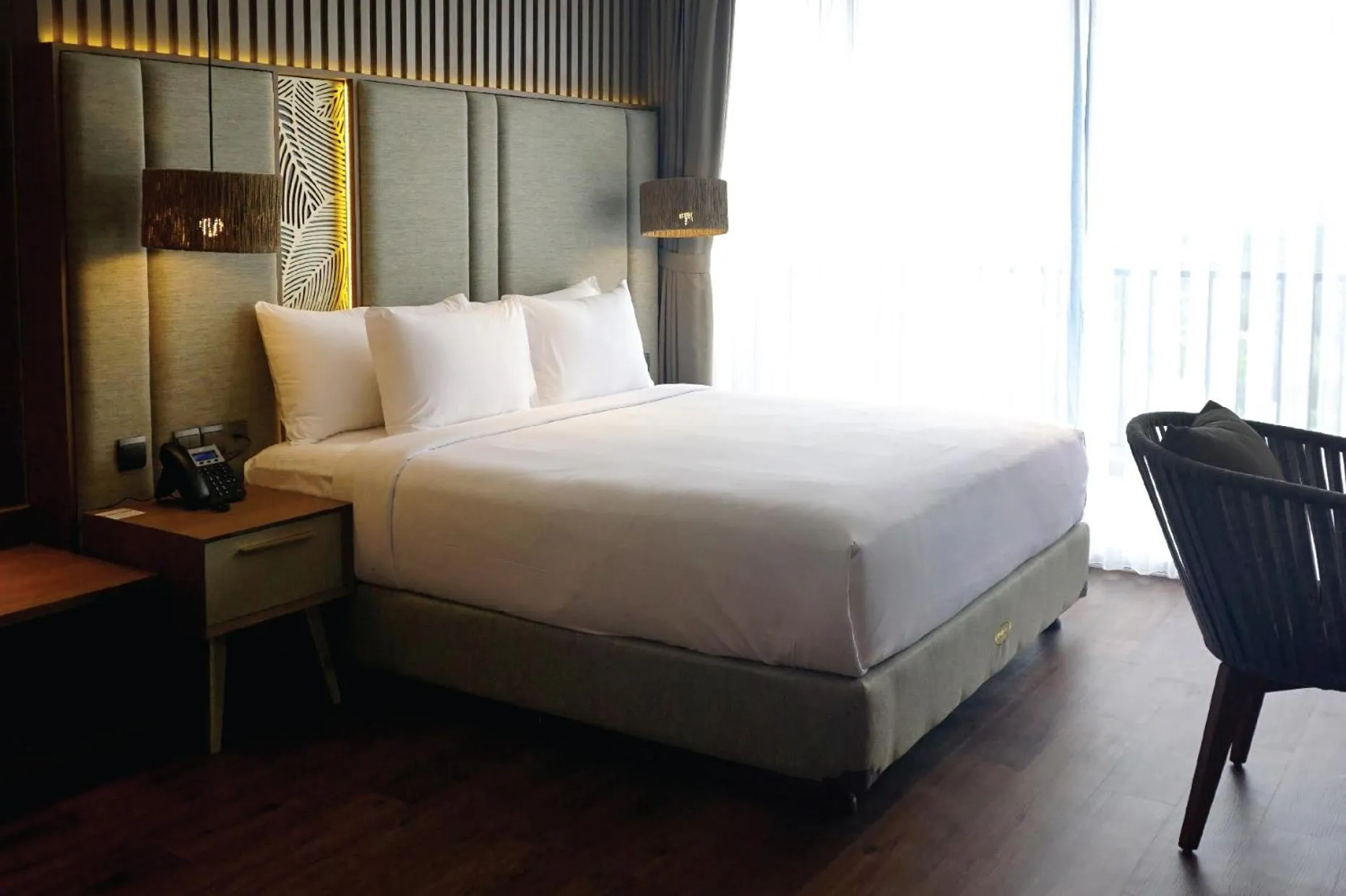 Bed in The Balcone Suites & Resort