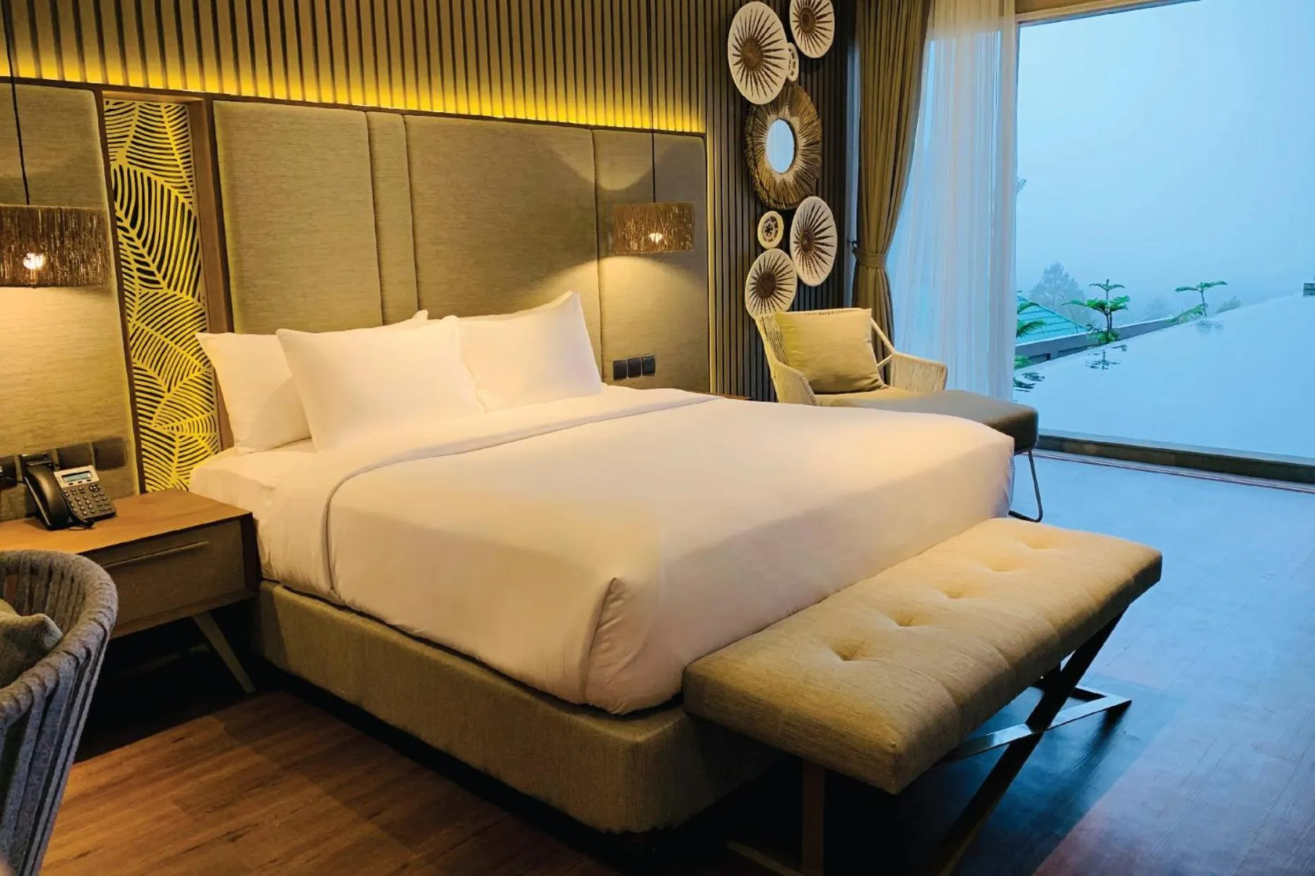 Bed in The Balcone Suites & Resort