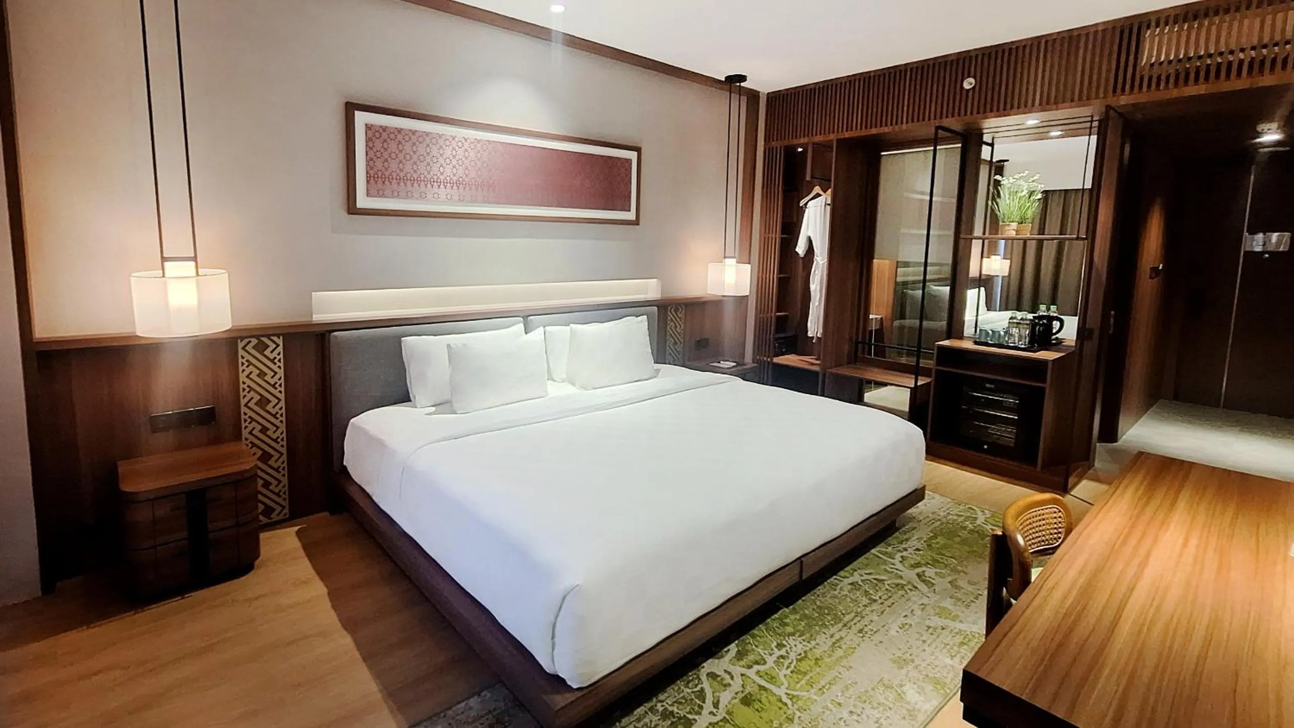 Bed in The Balcone Suites & Resort