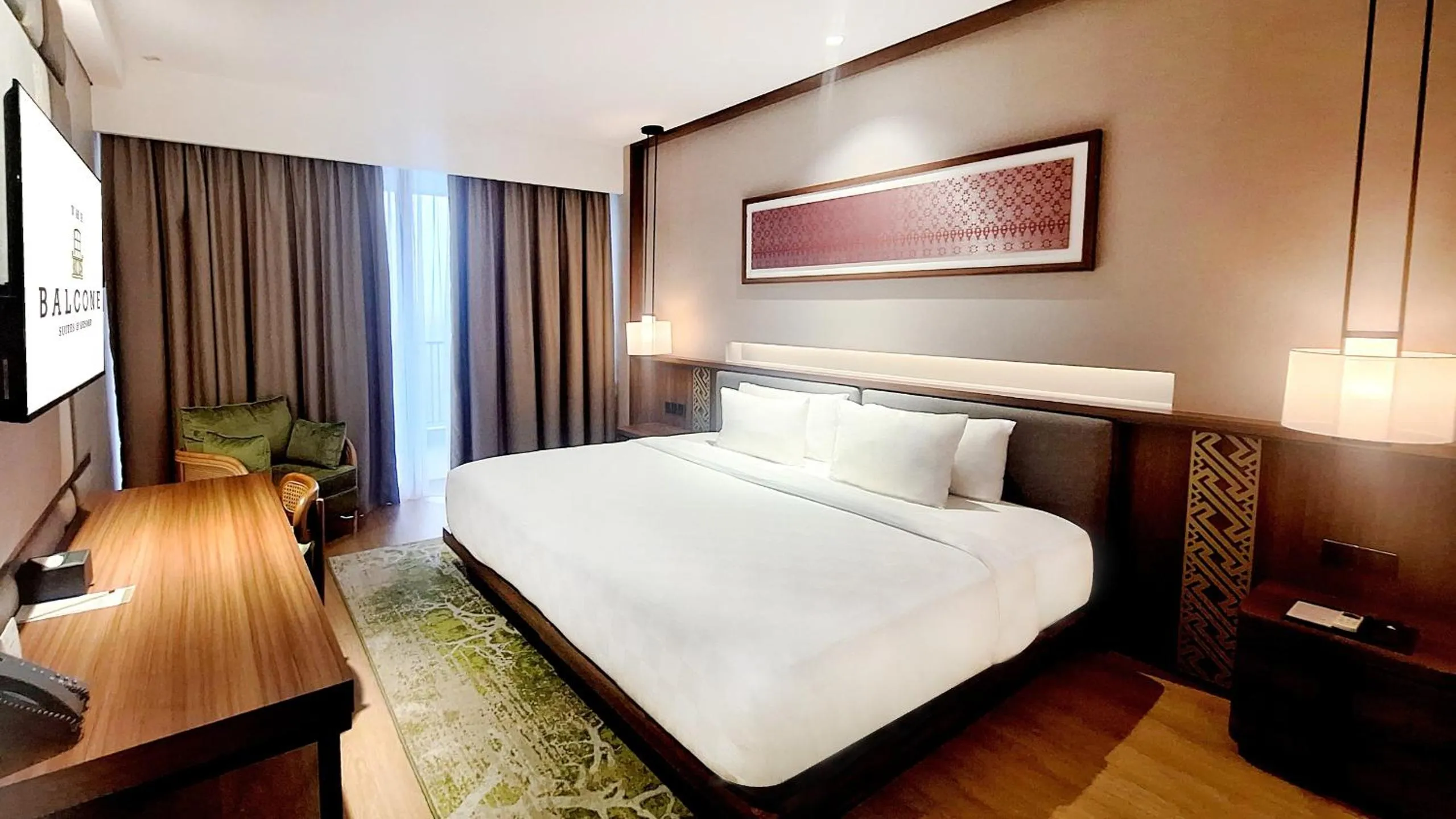 Bed in The Balcone Suites & Resort