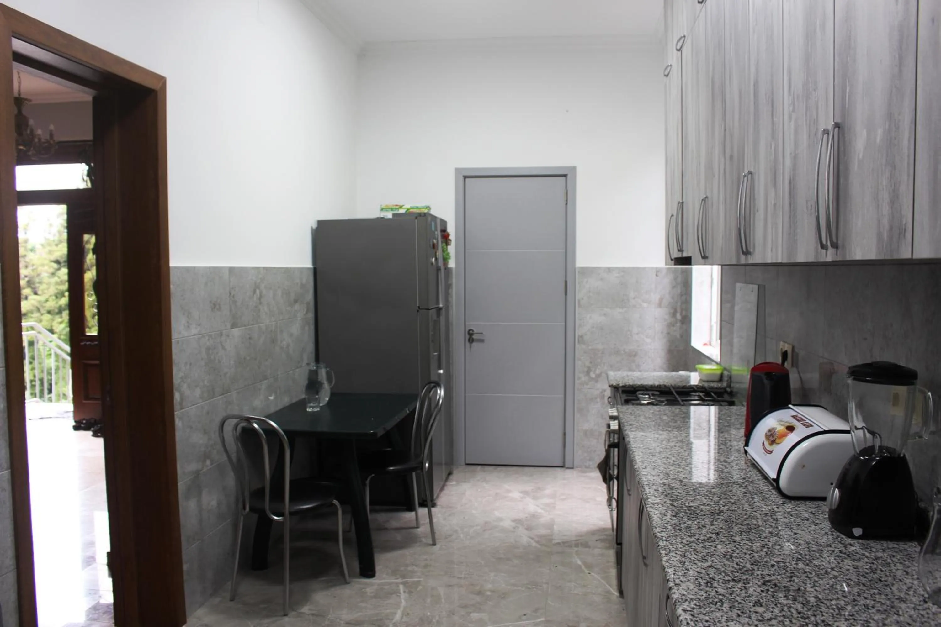 Communal kitchen, Bed in Green Cape Tower