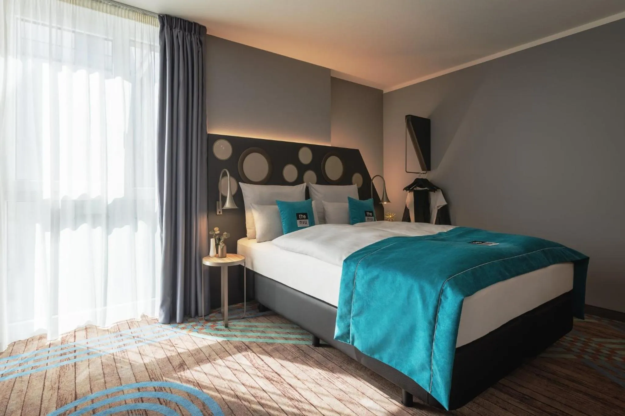 Photo of the whole room, Bed in Holiday Inn - the niu, Brass Munich Olympiapark by IHG