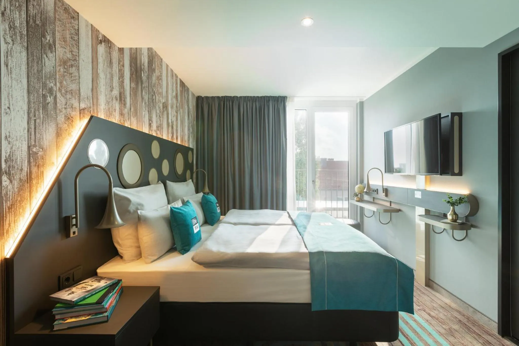 Photo of the whole room, Bed in Holiday Inn - the niu, Brass Munich Olympiapark by IHG