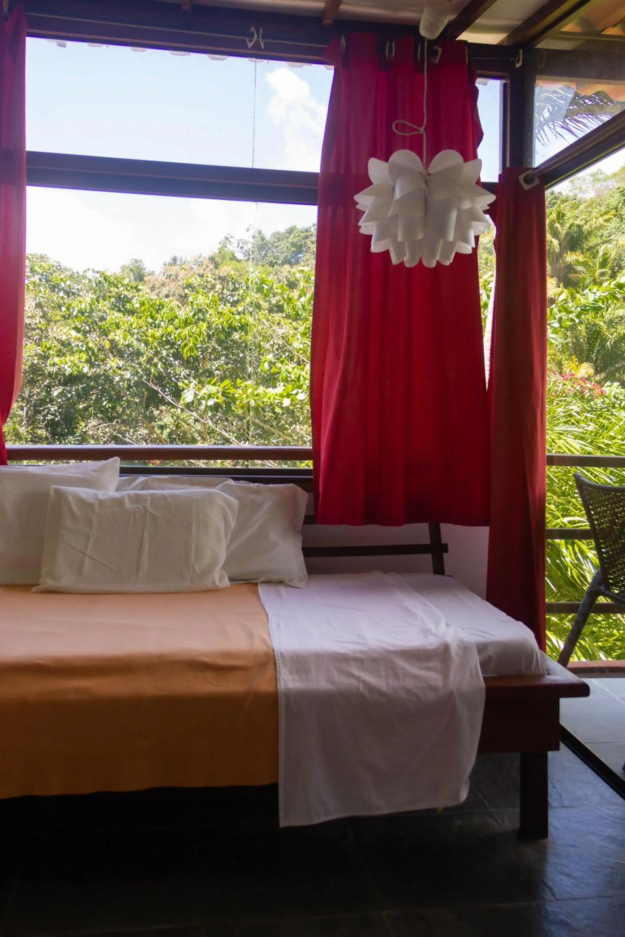 Bed in Pousada Aquarela