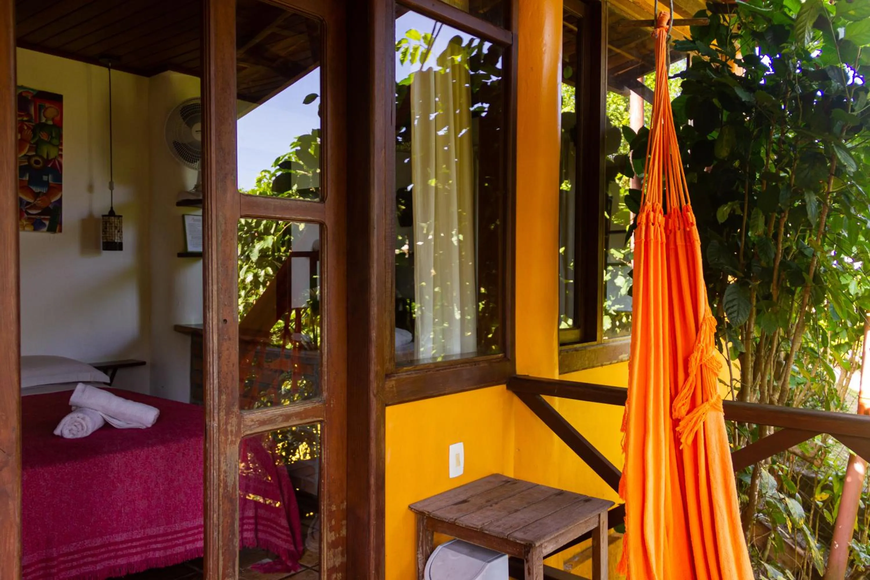 Balcony/Terrace, Bed in Pousada Aquarela