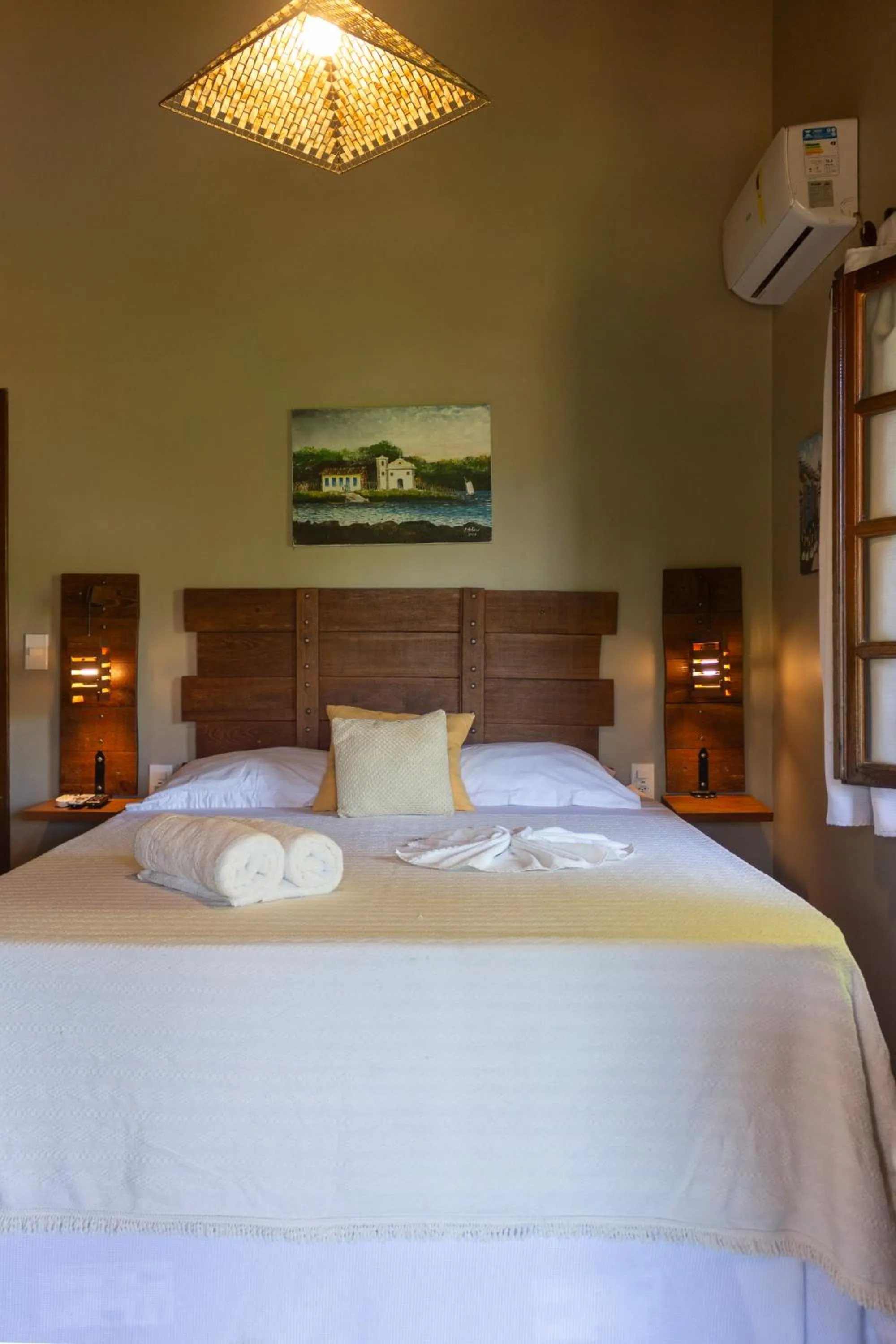 Bed in Pousada Aquarela