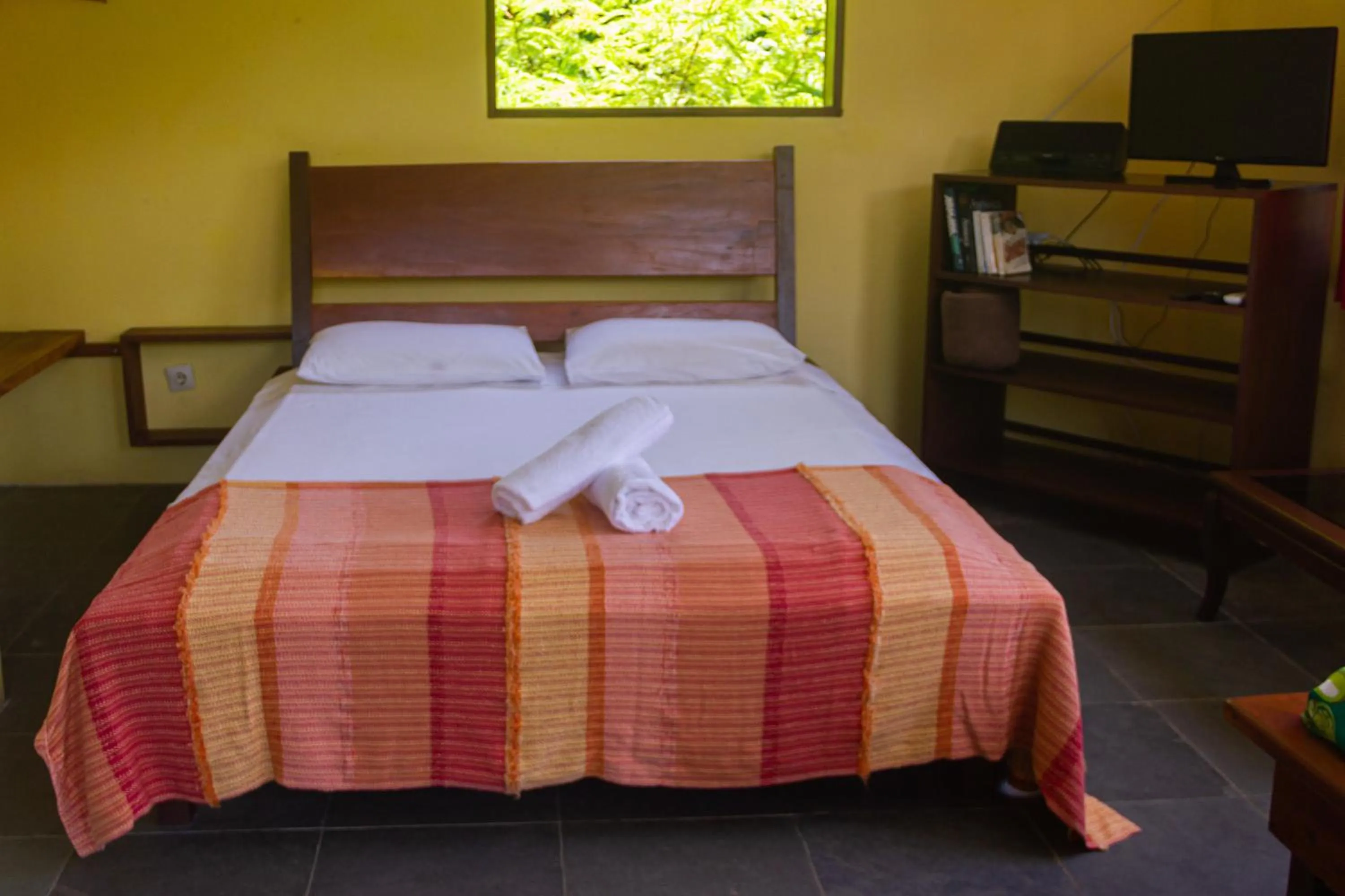 Bed in Pousada Aquarela