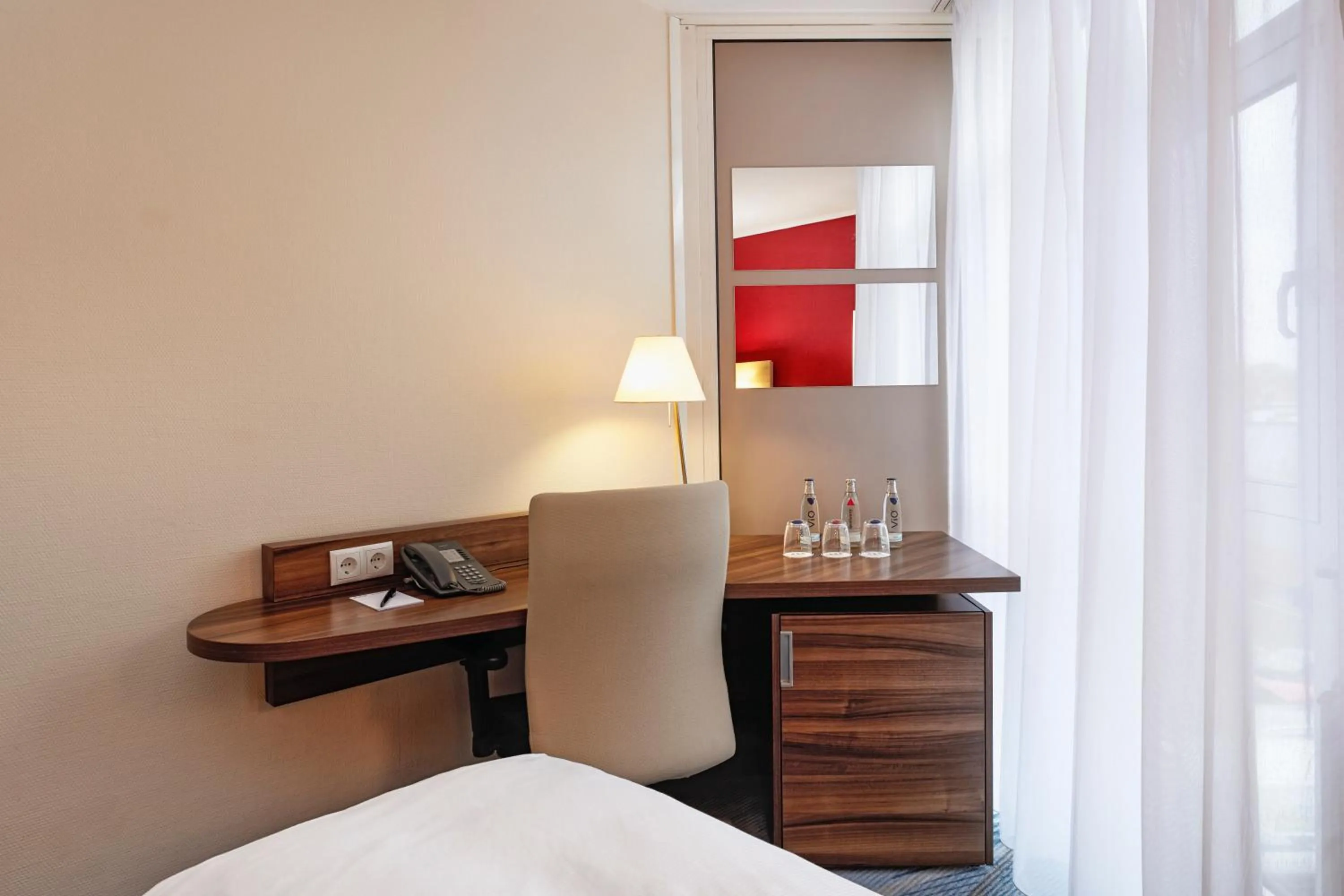 Photo of the whole room, Bed in H+ Hotel Köln Brühl