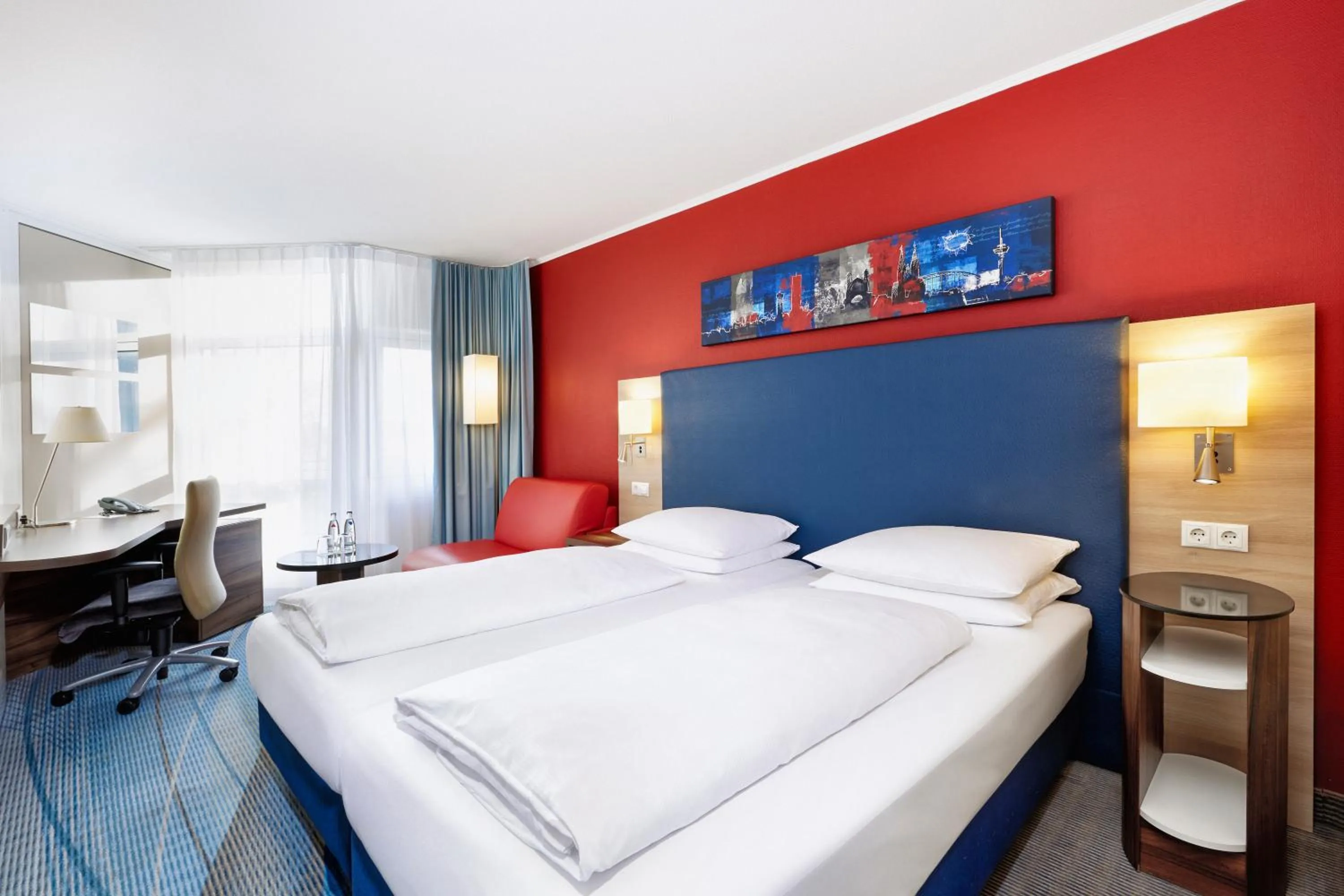 Photo of the whole room, Bed in H+ Hotel Köln Brühl