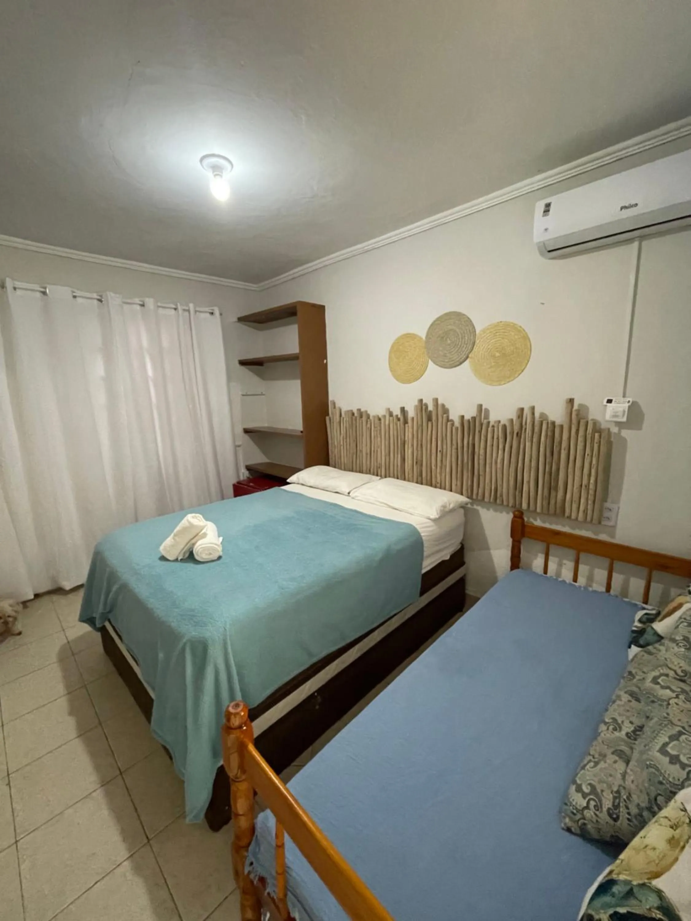 Bed in Pousada Nativo