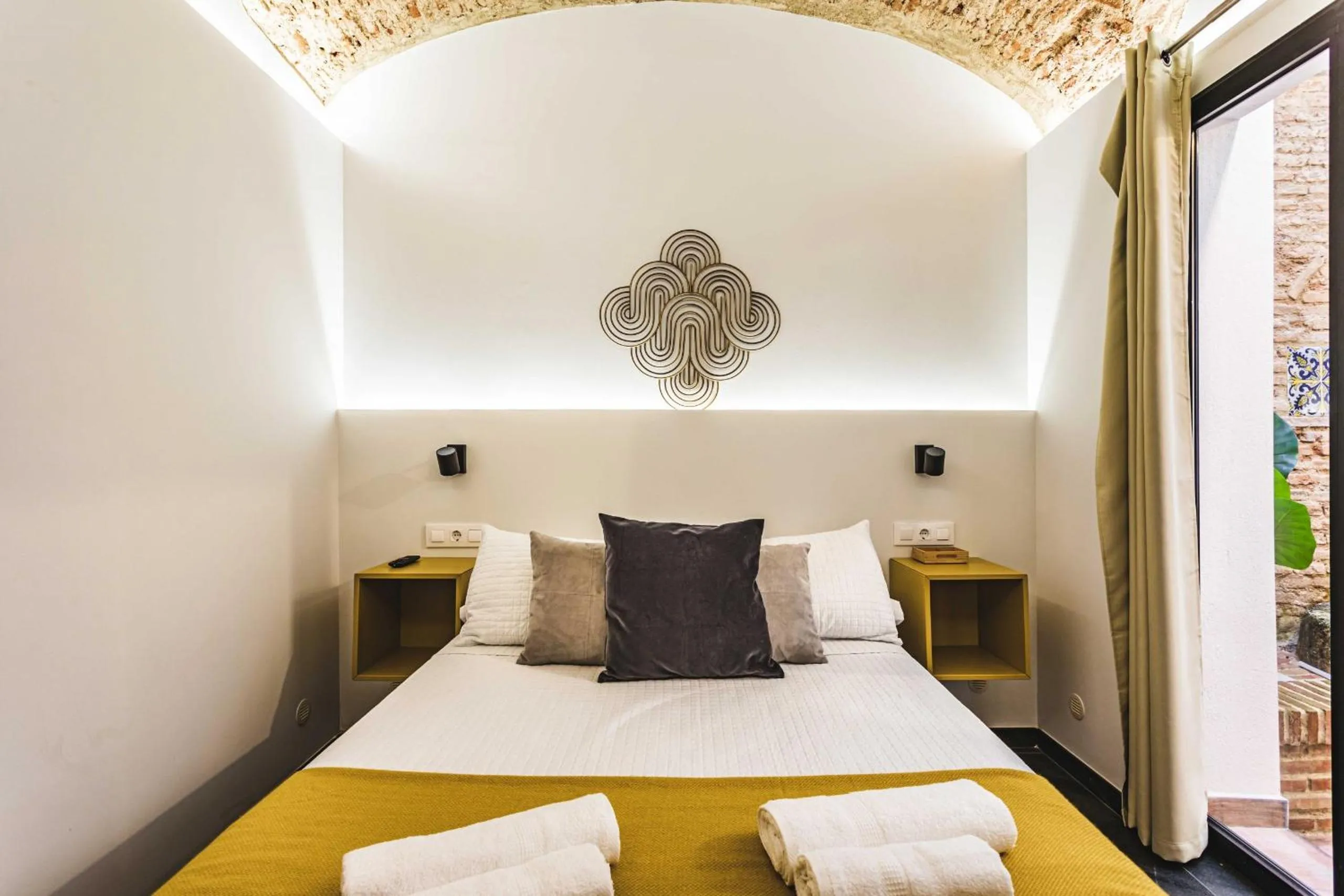 Bed in Apartamentos Cáceres Central Suites