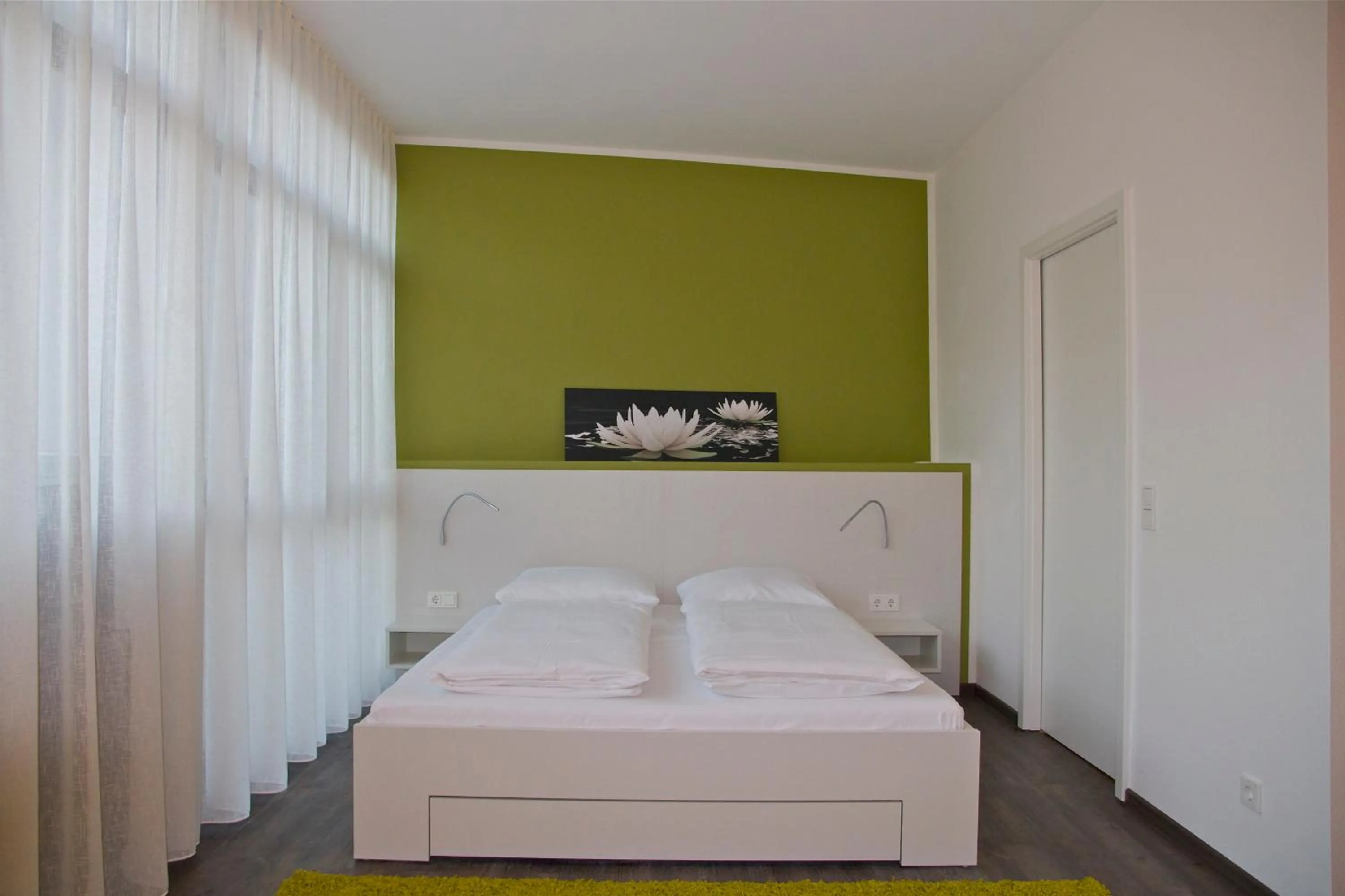 Photo of the whole room, Bed in Boardinghouse Offenbach Service Apartments