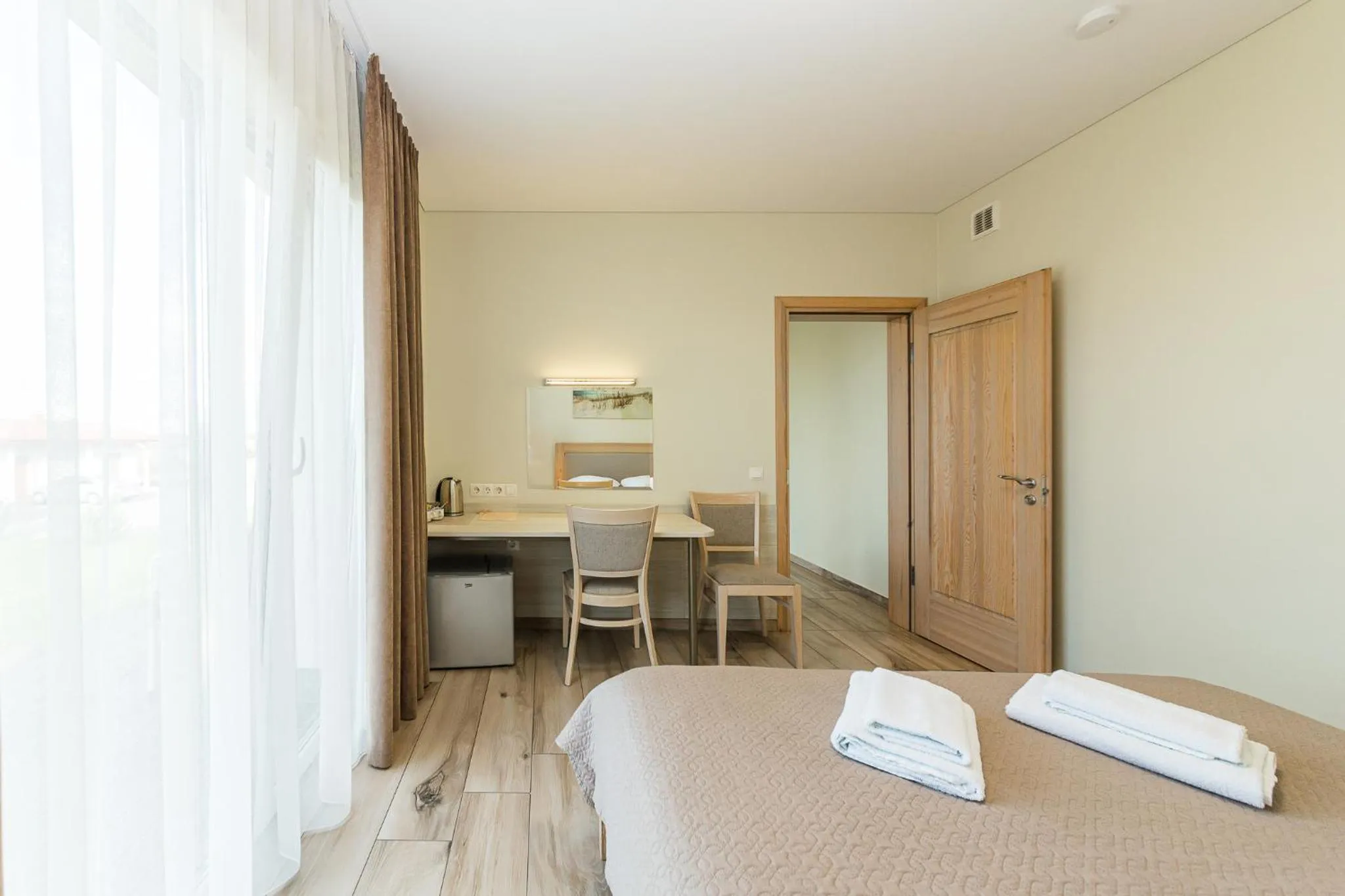 Bed in Motel Panorama