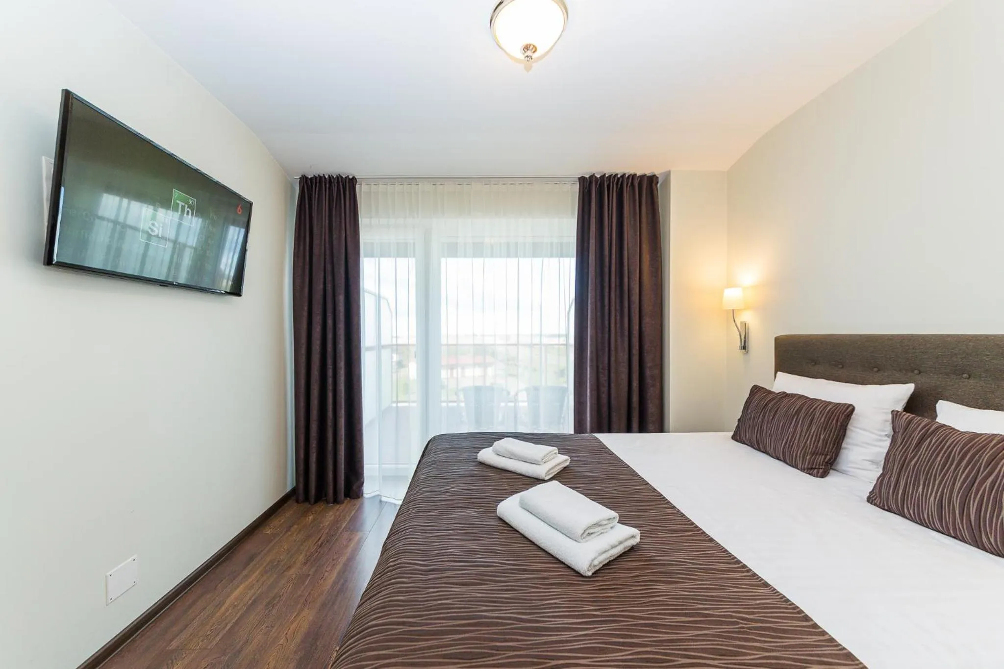 Bed in Motel Panorama