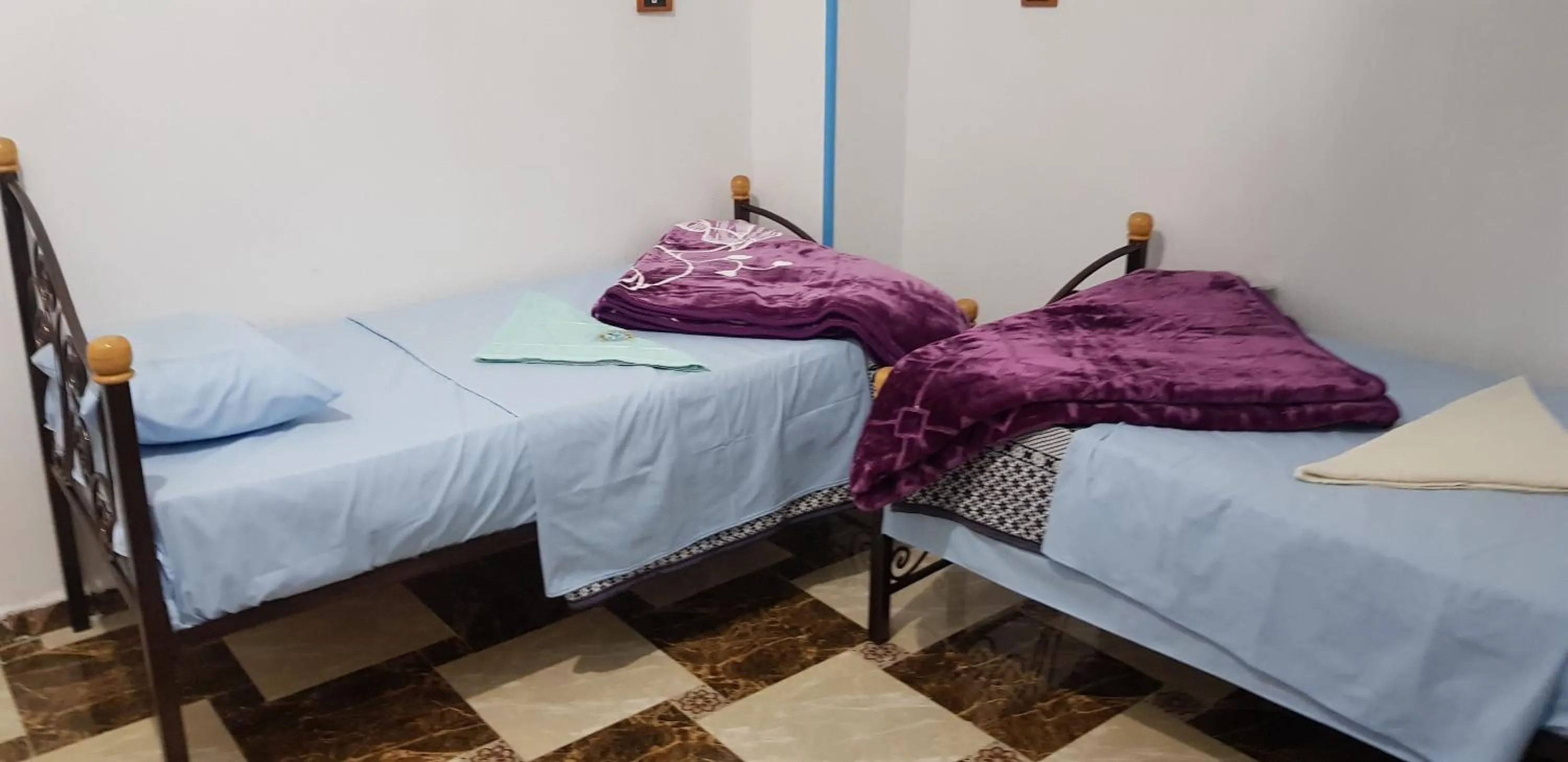 Bed in Nuba Tod Abouda Guest House