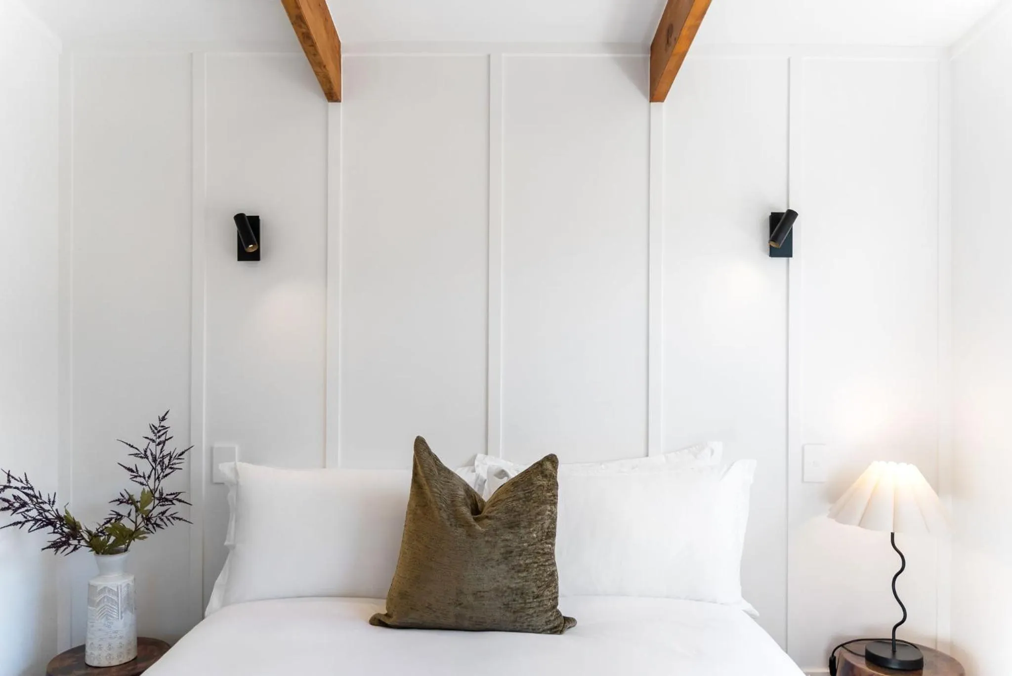 Bed in Tui & Nikau Cabins