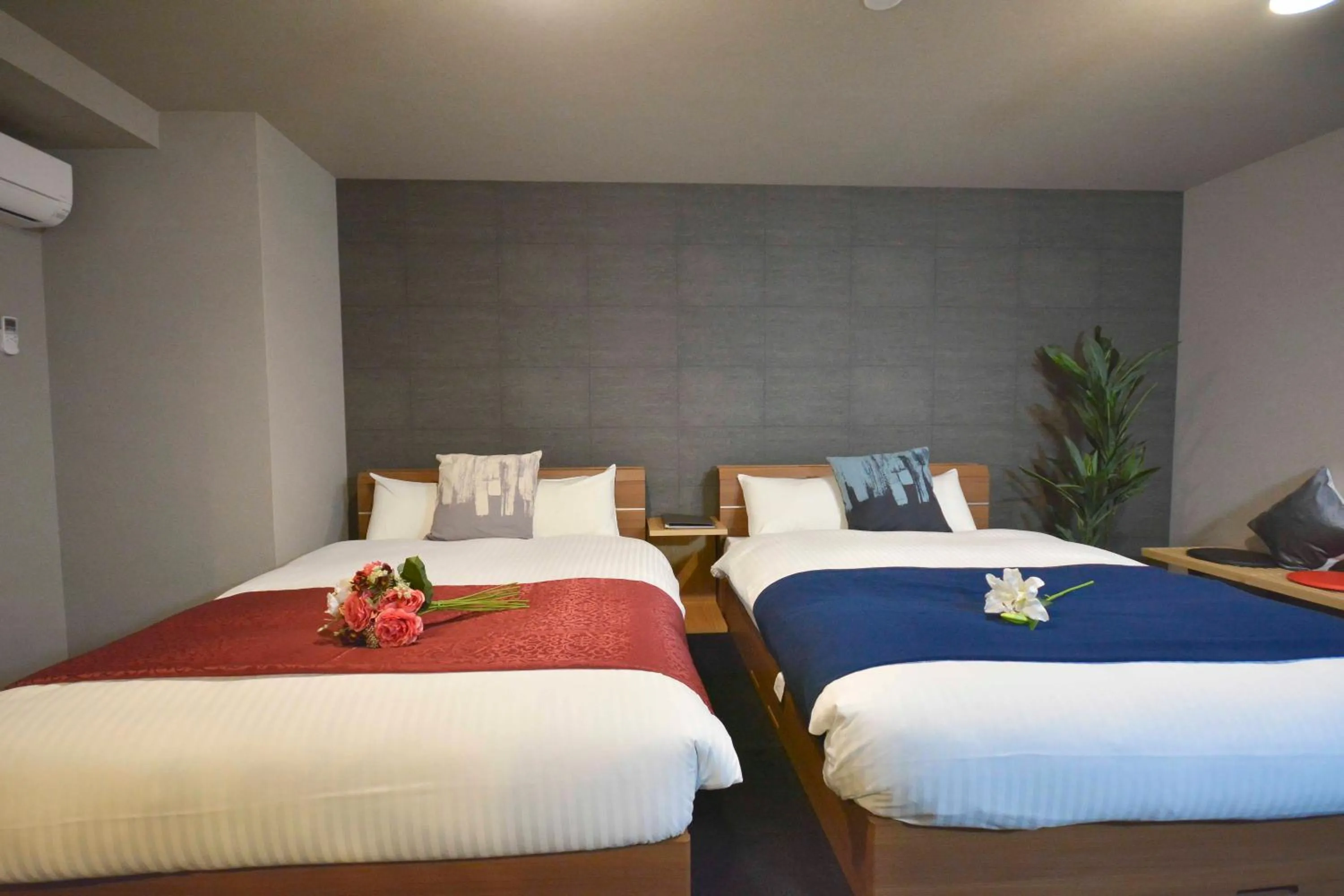 Photo of the whole room, Bed in The Grand Residence Hotel Tenjin