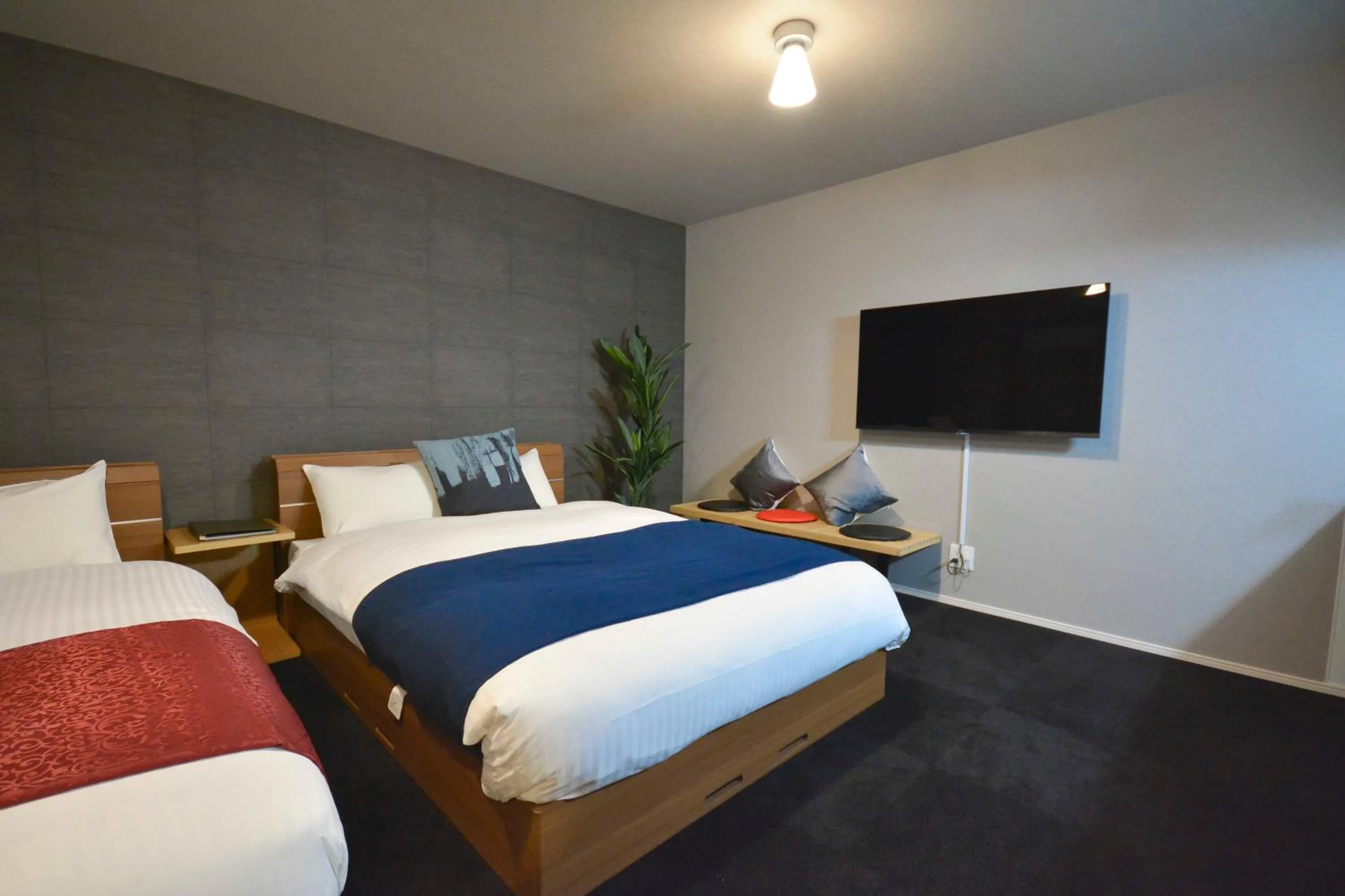 Bed in The Grand Residence Hotel Tenjin