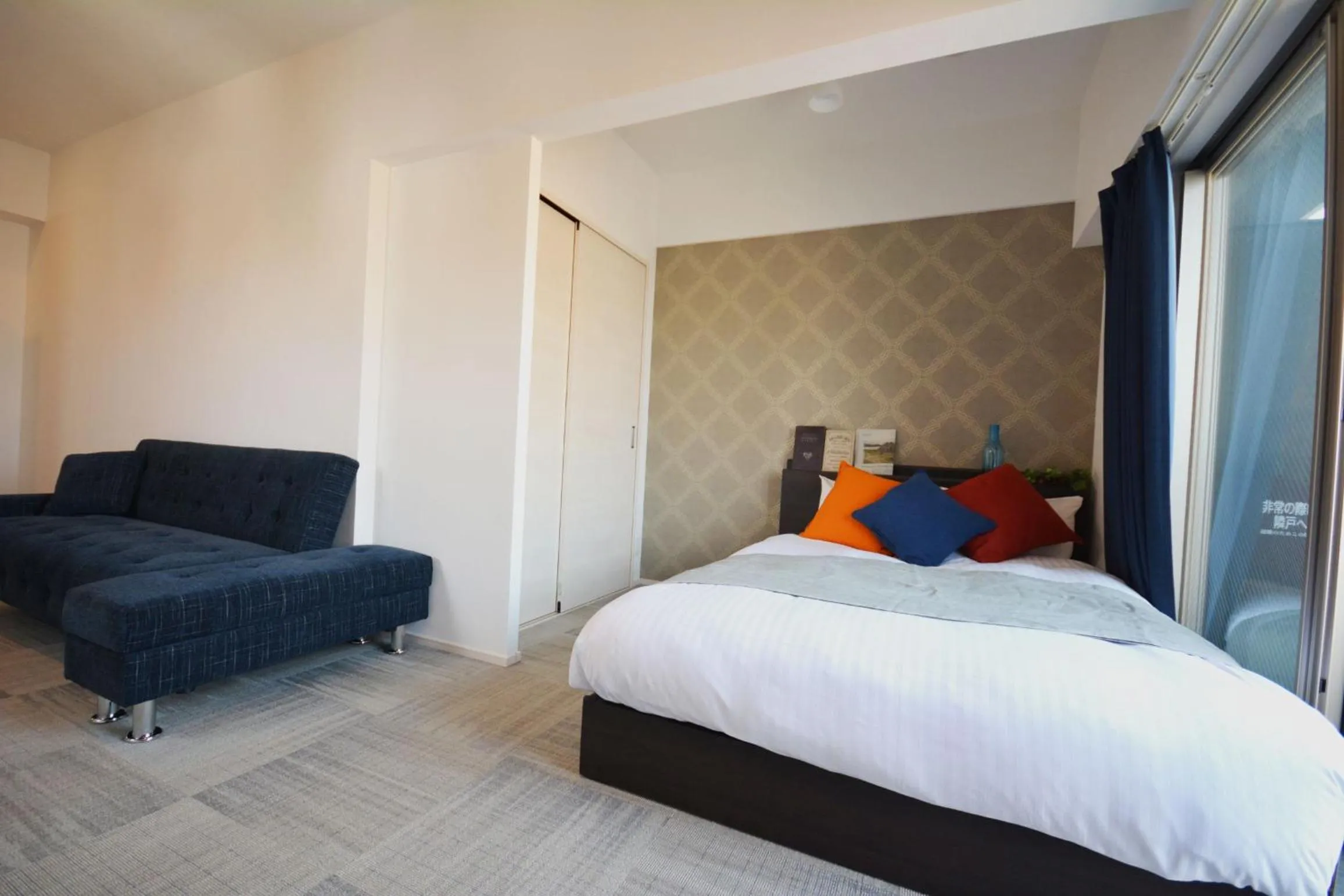 Photo of the whole room, Bed in The Grand Residence Hotel Tenjin