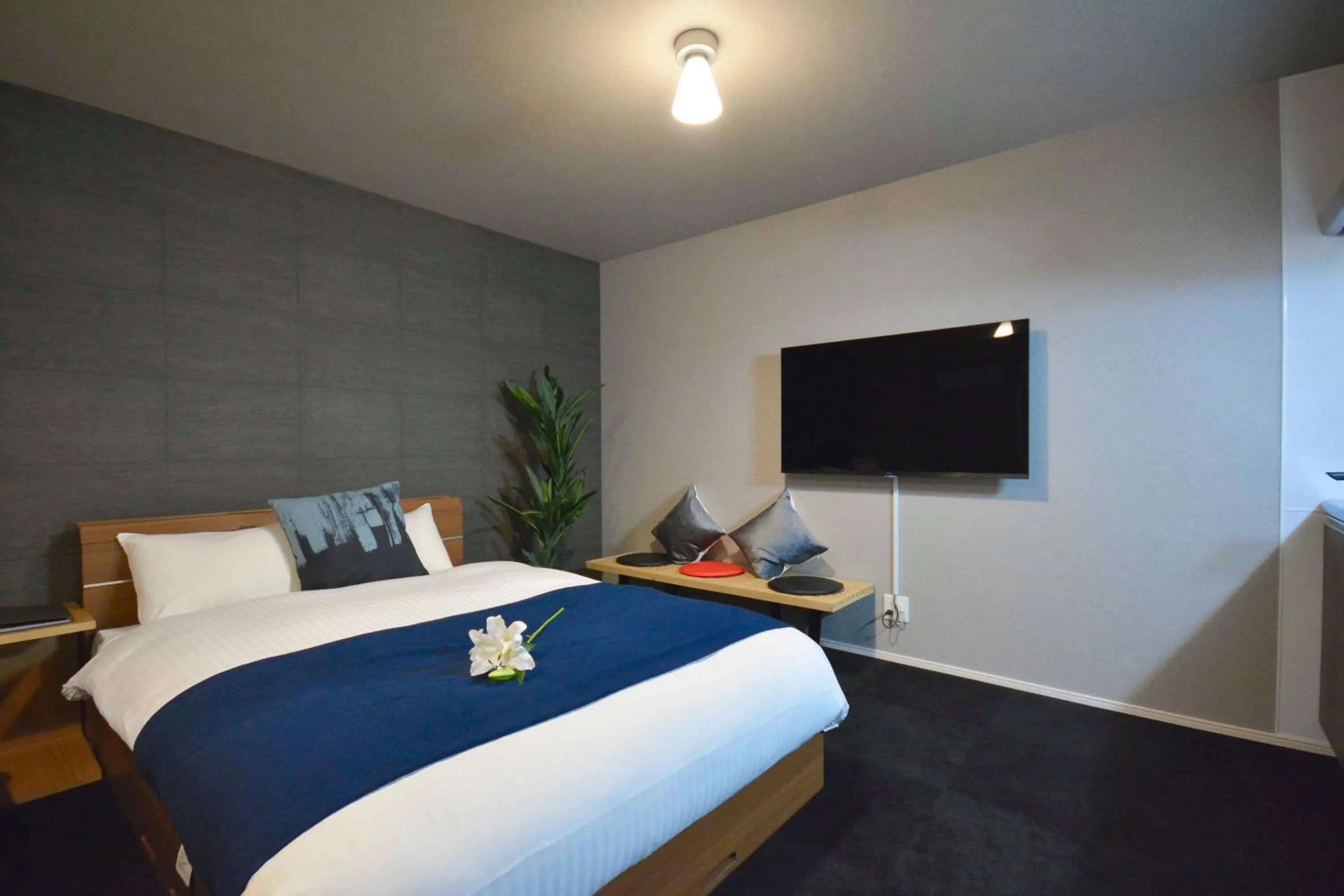 Photo of the whole room, Bed in The Grand Residence Hotel Tenjin