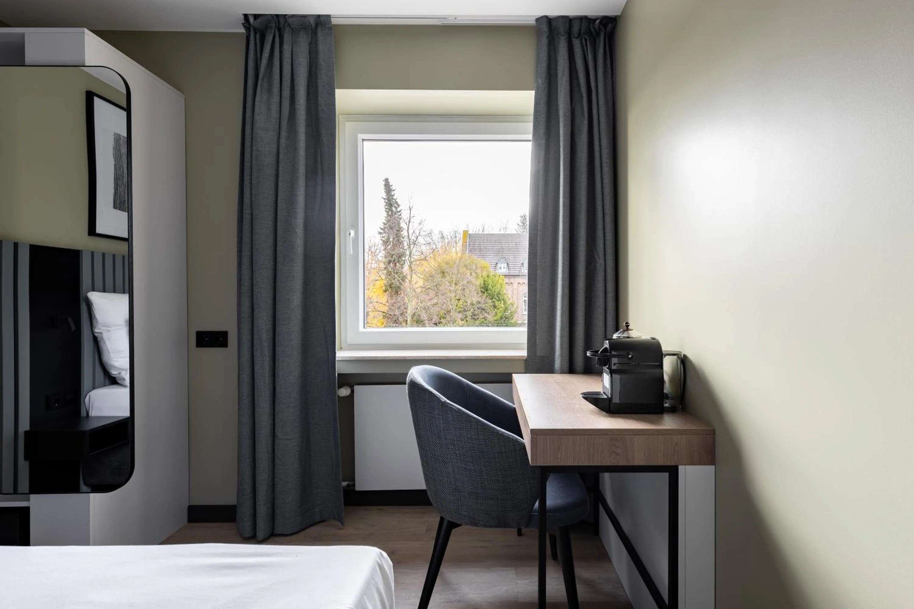 Seating area, Bed in Numa Bona