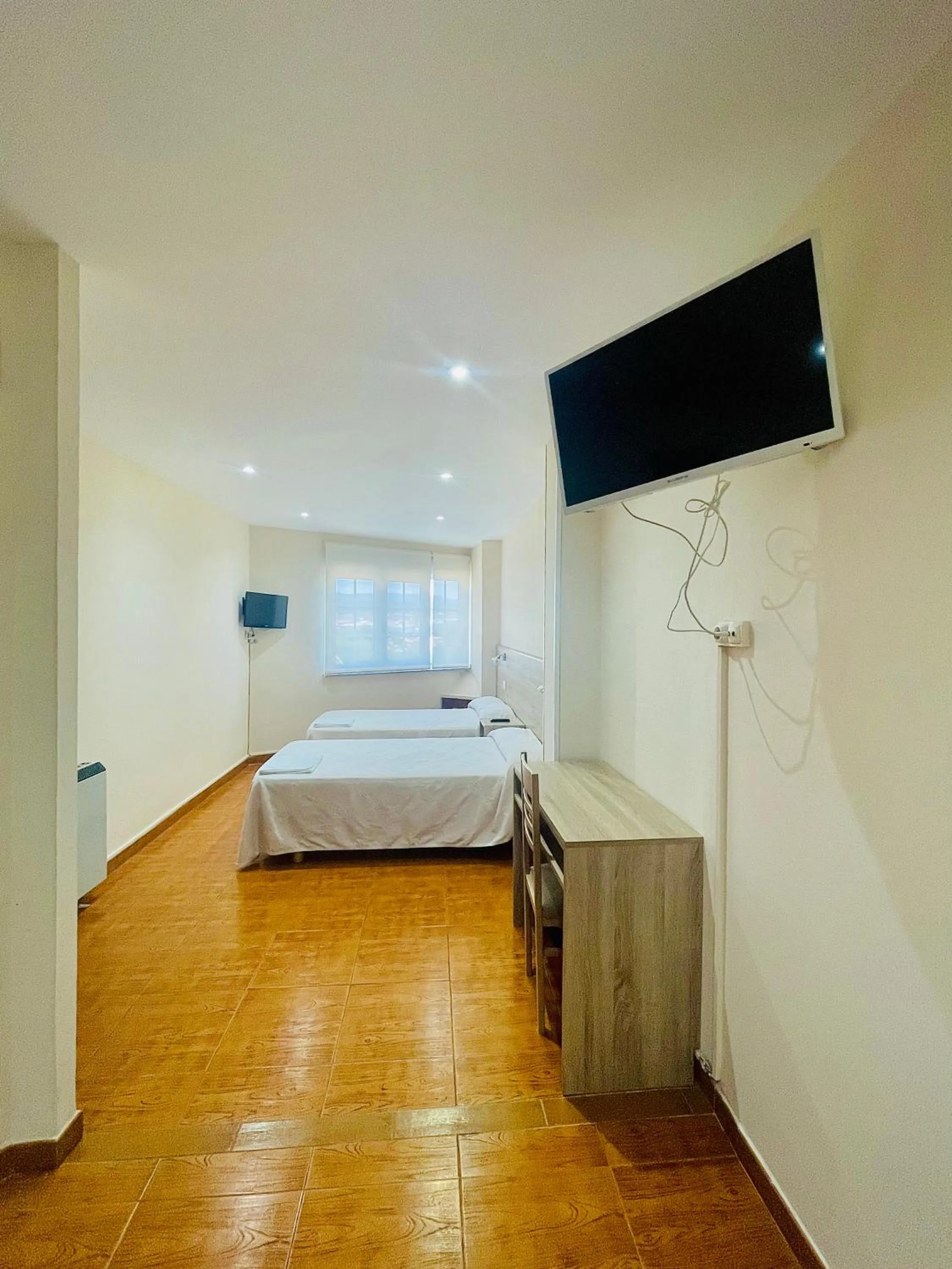 Bed in Pensión Costiña