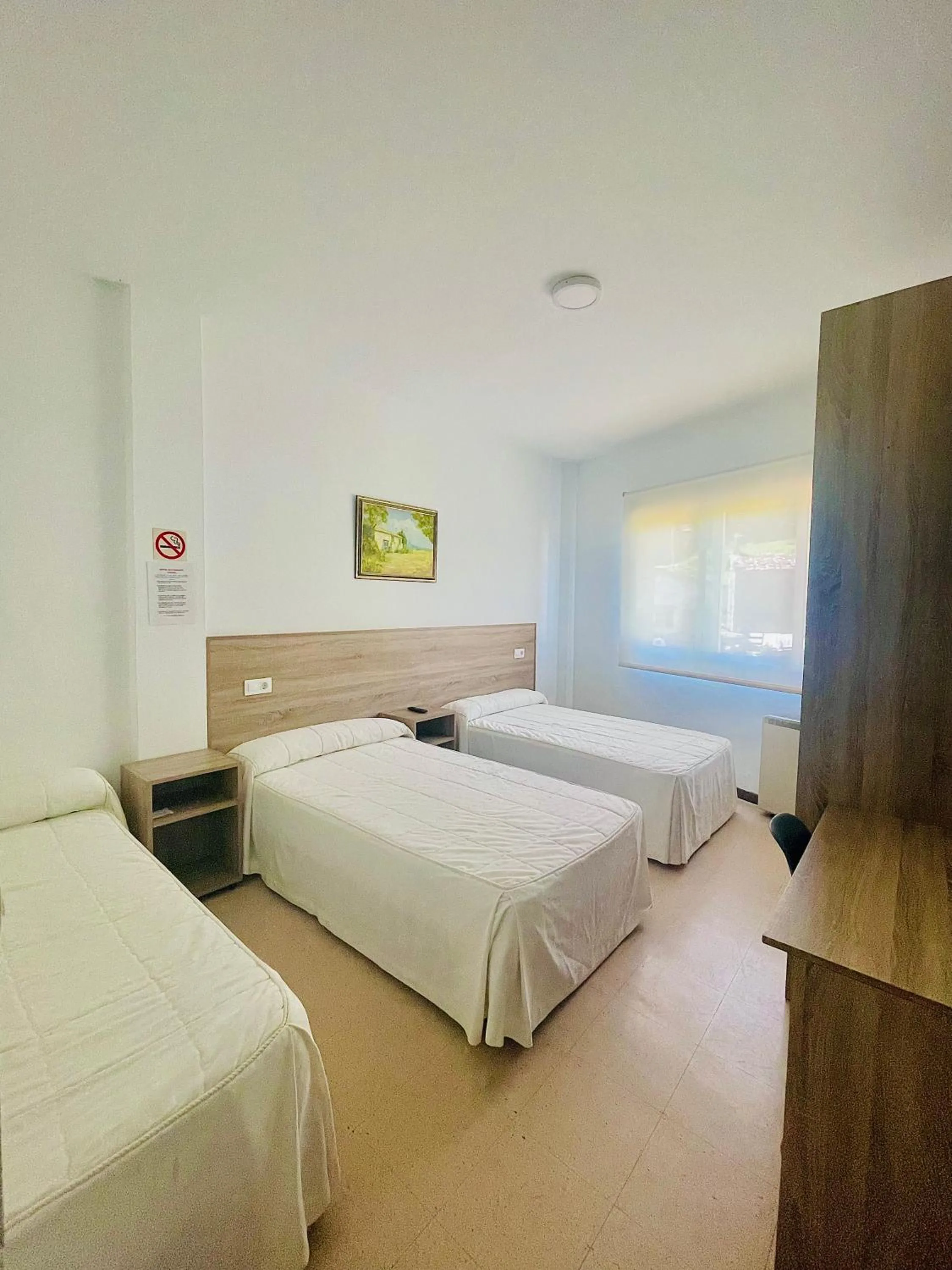 Bed in Pensión Costiña