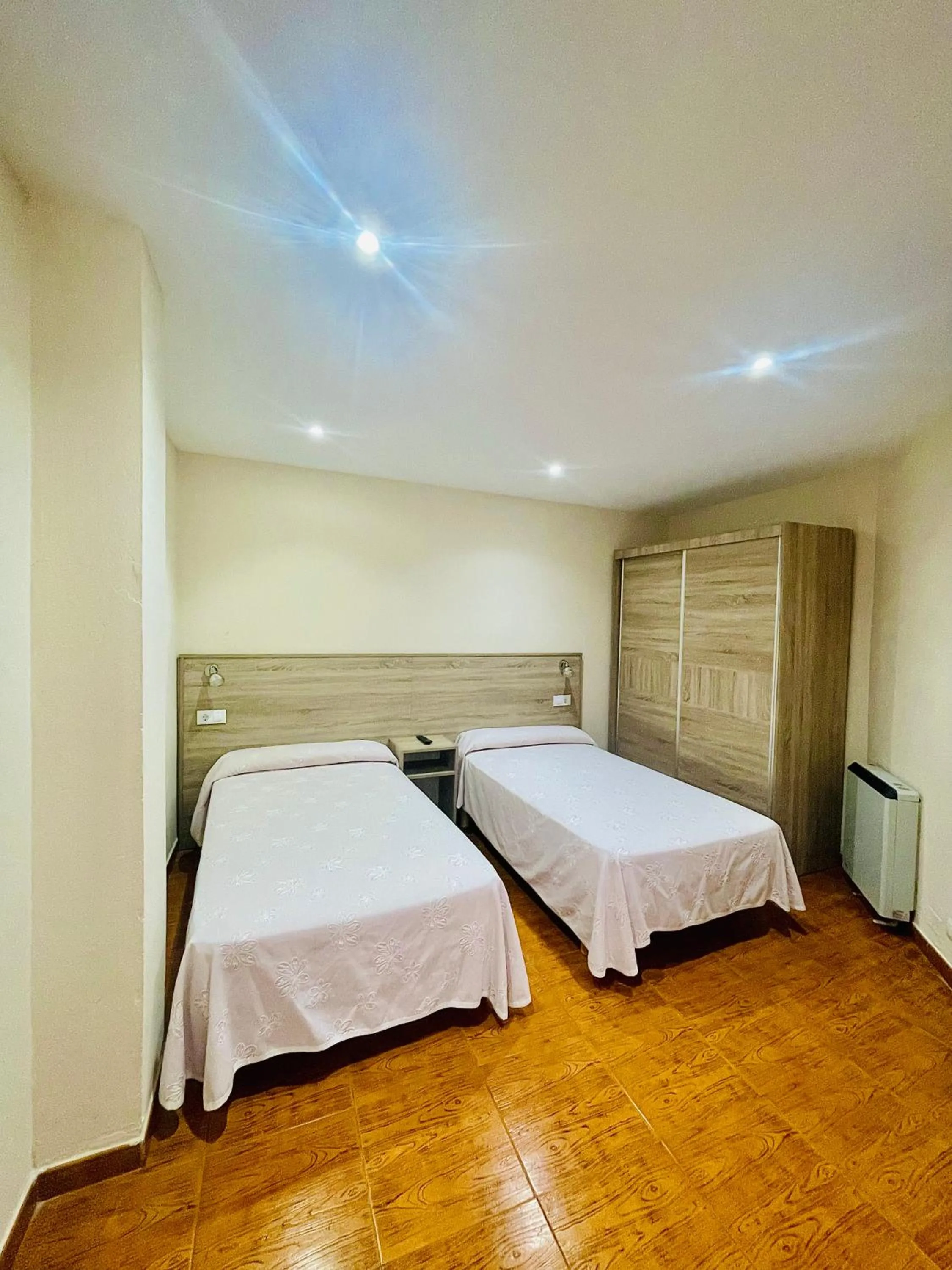 Bed in Pensión Costiña