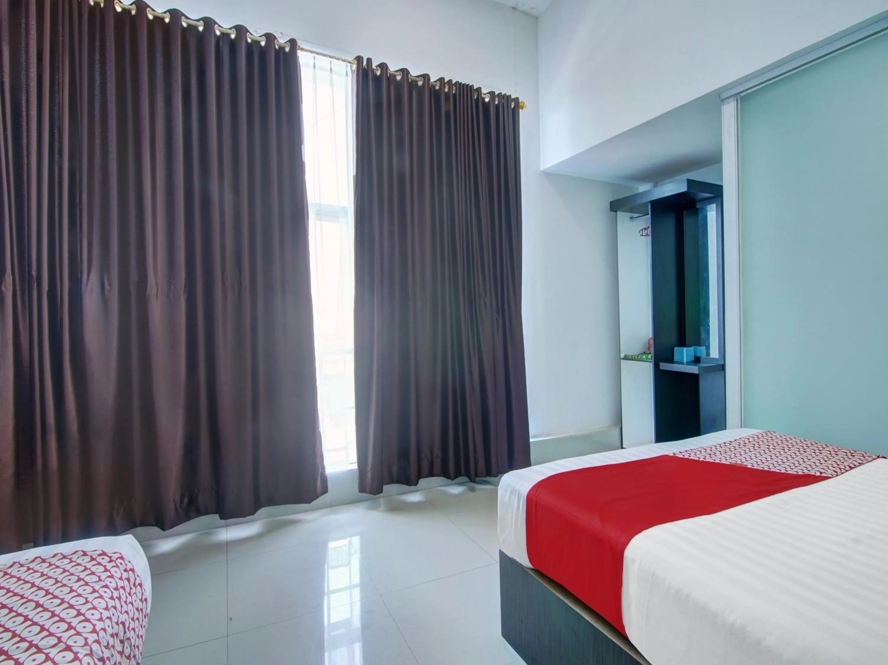 Bedroom, TV/Entertainment Center in OYO 90419 Azzahra Homestay Syariah