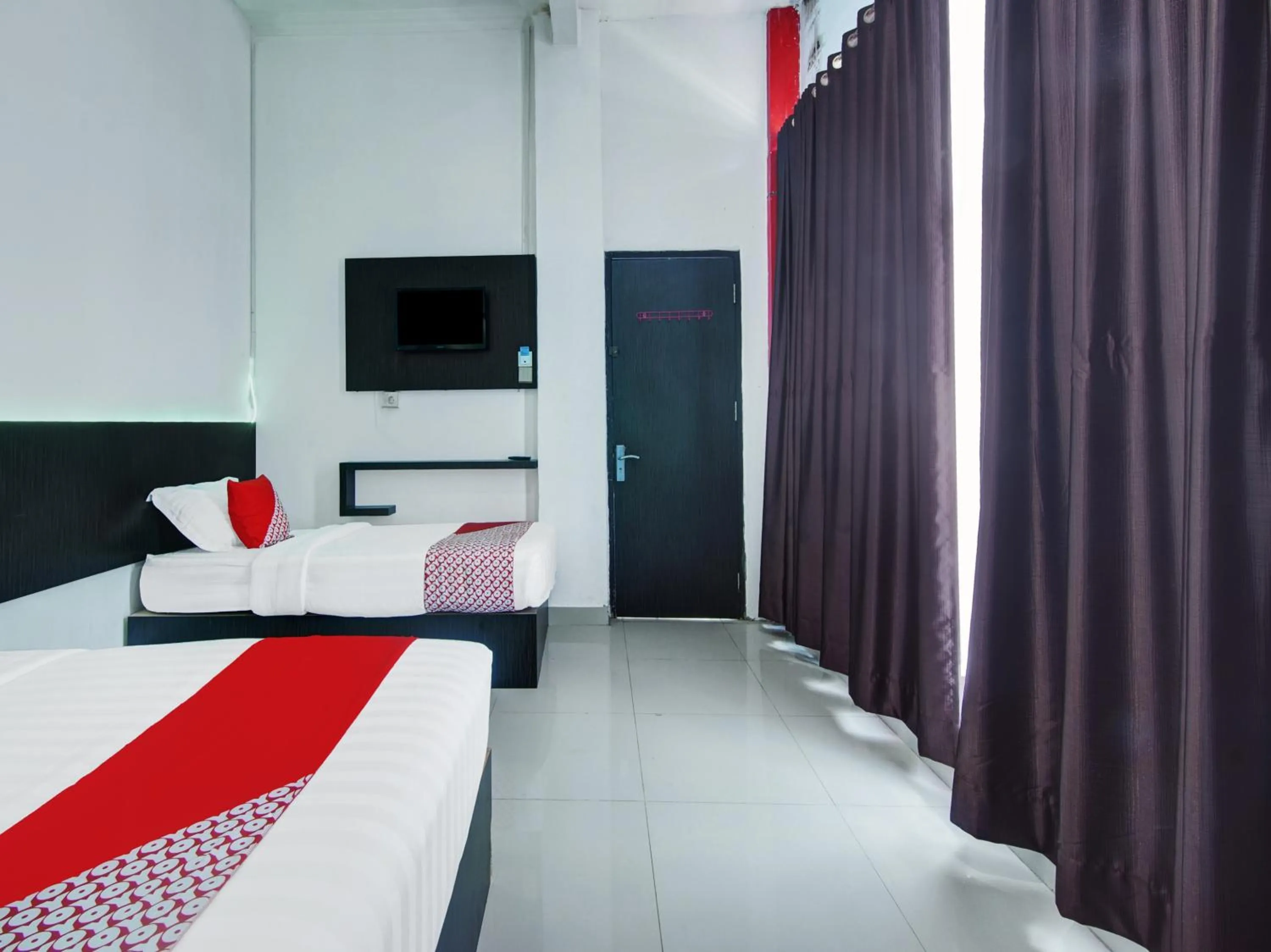 Bedroom, TV/Entertainment Center in OYO 90419 Azzahra Homestay Syariah