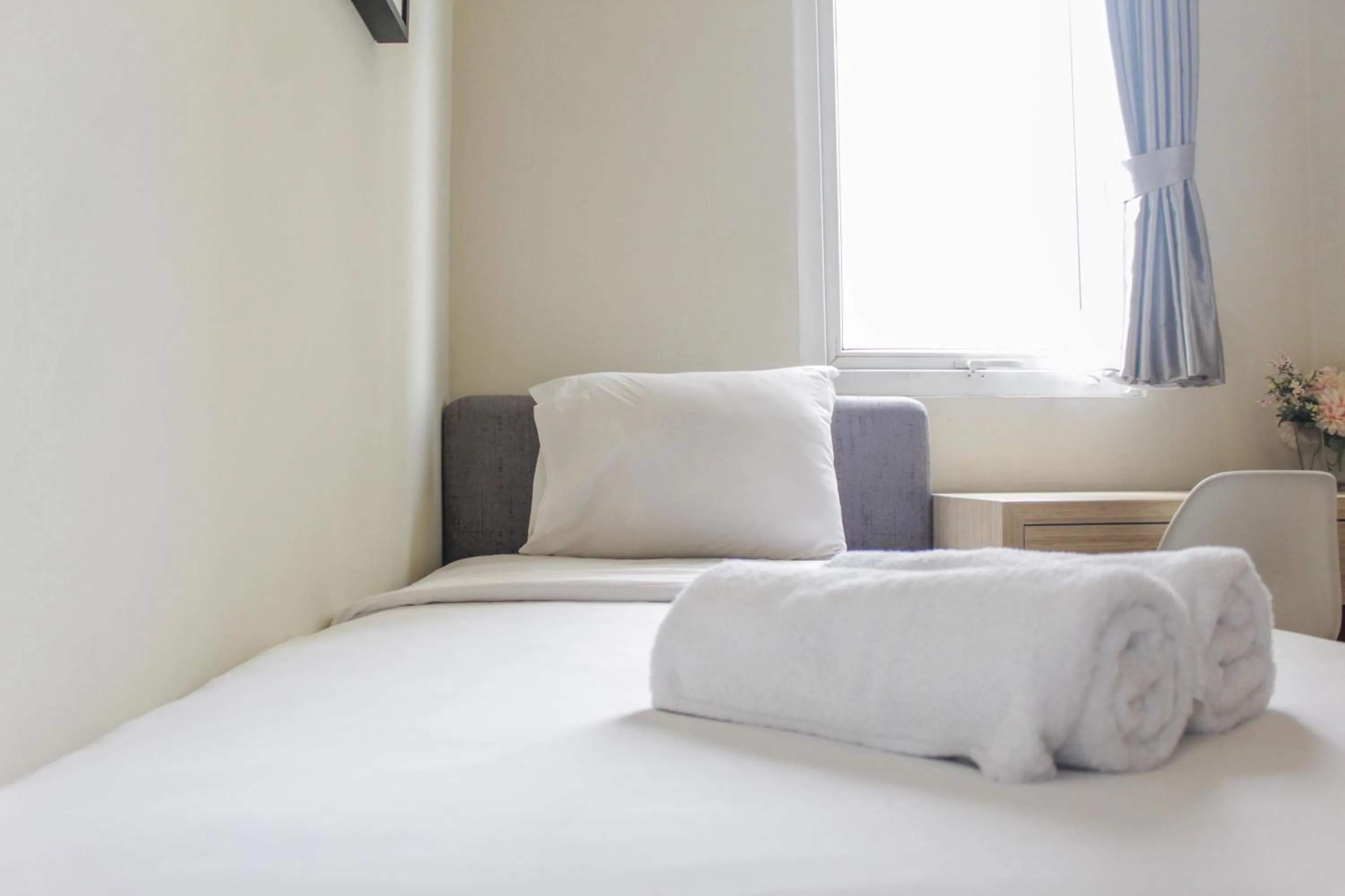 Bedroom, Bed in Homey 2BR Apartment at Grand Palace Kemayoran By Travelio