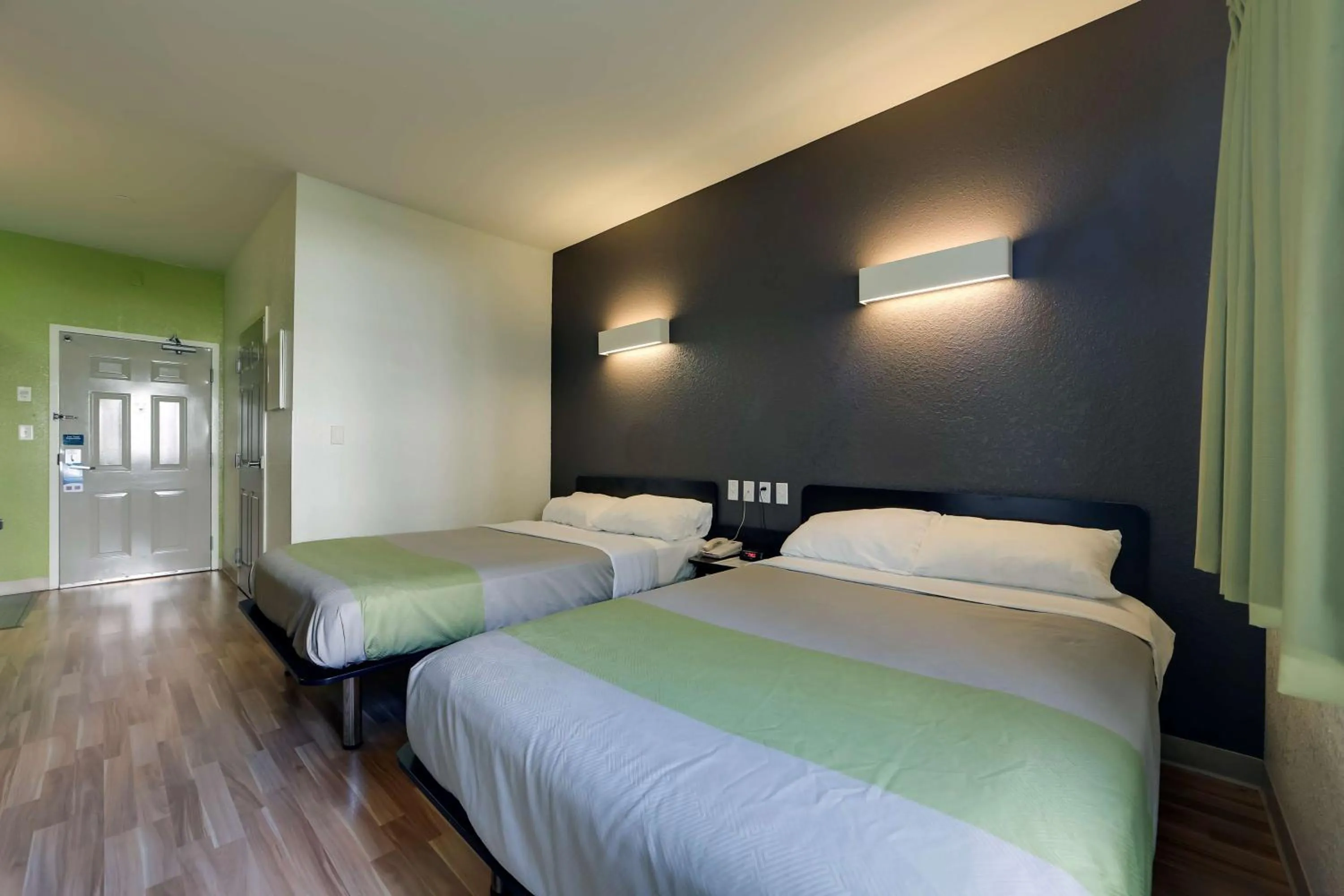 Photo of the whole room, Bed in Studio 6 Toronto - Mississauga with Kitchenettes