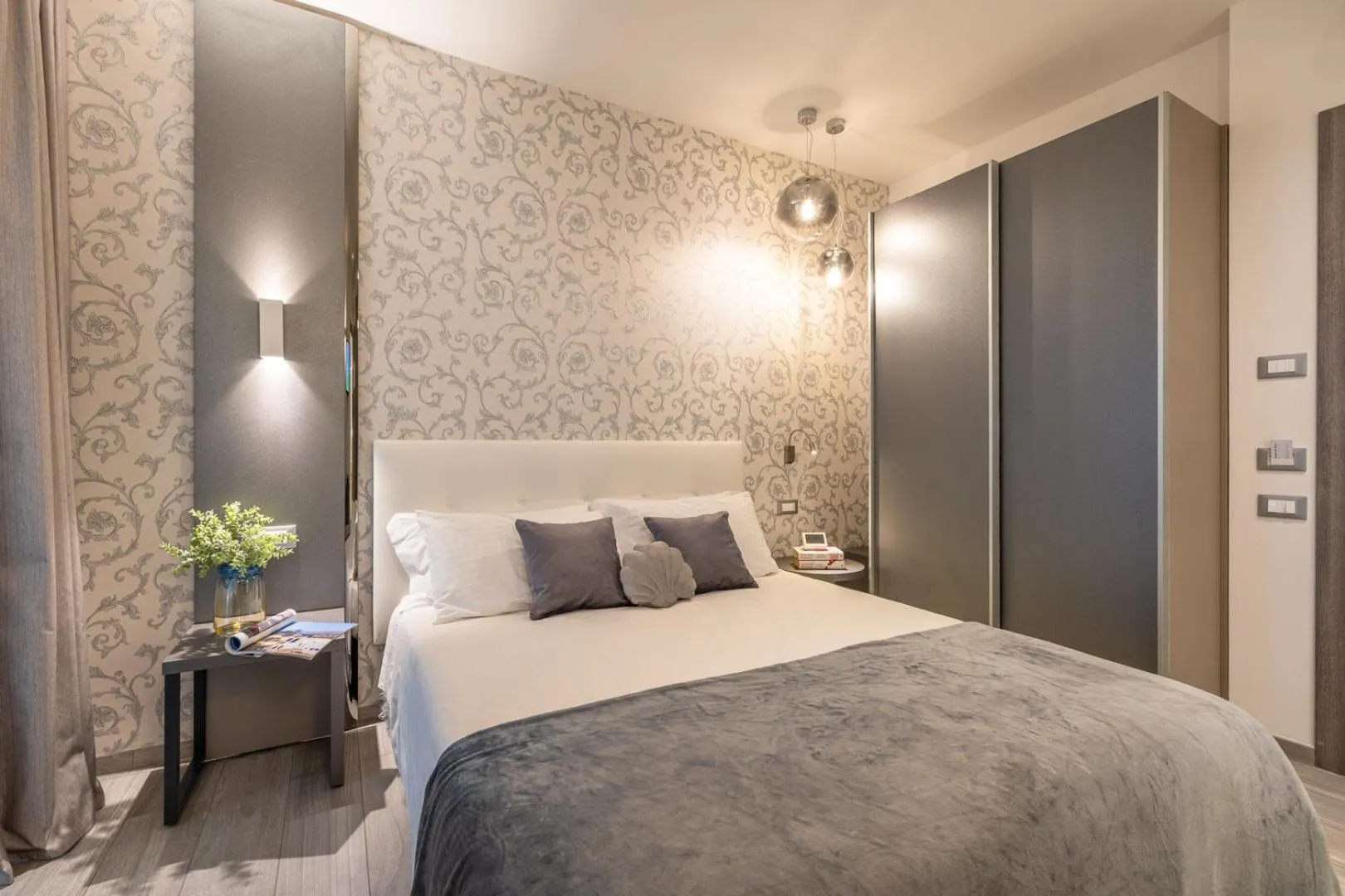 Bed in Romagna Suite Hotel