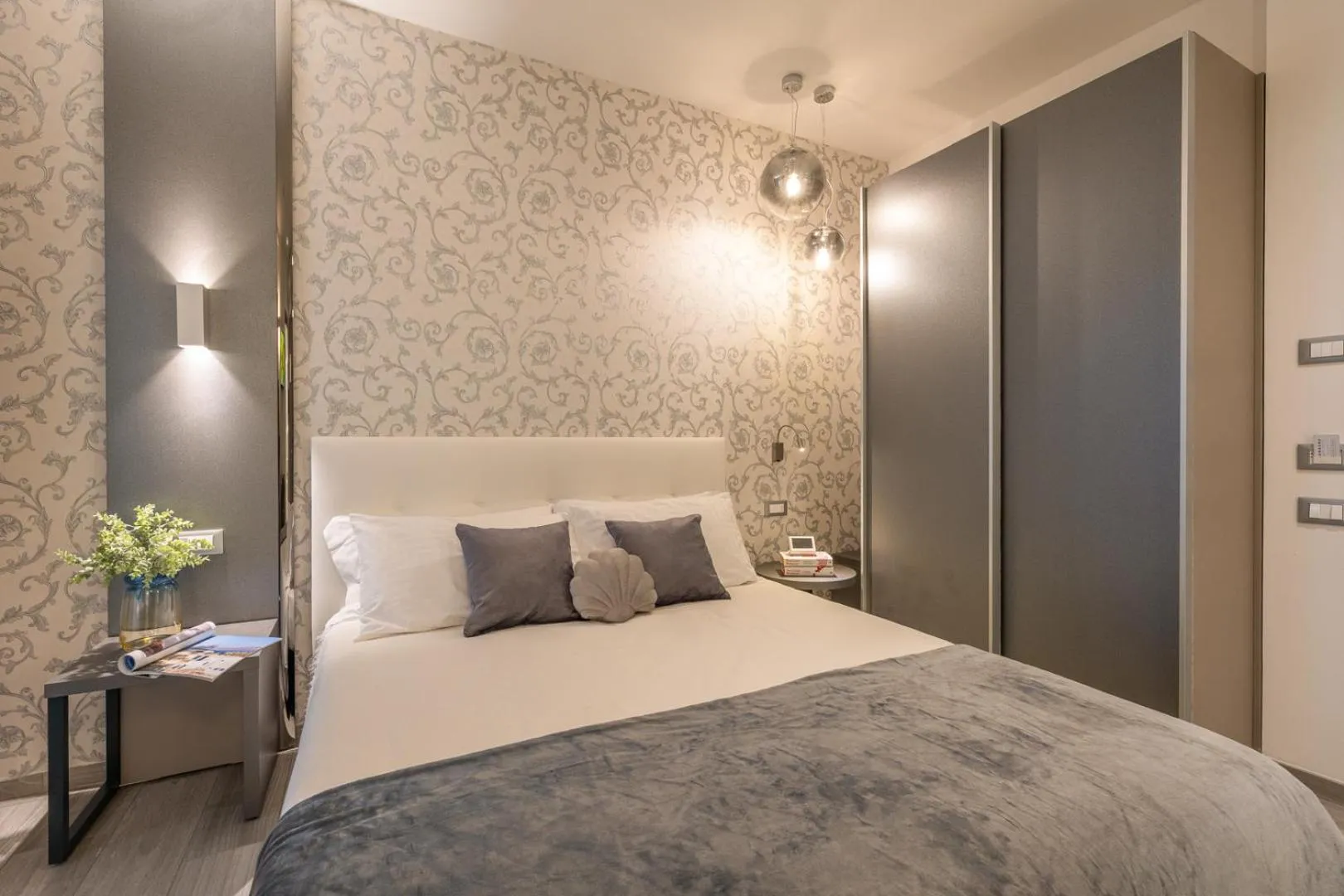 Bed in Romagna Suite Hotel