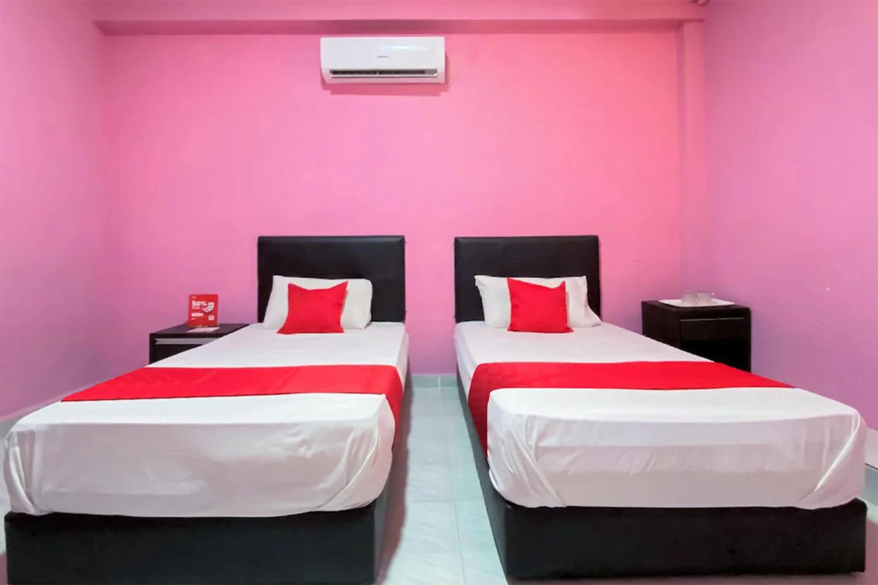 Bed in Coop Hotel Kangar