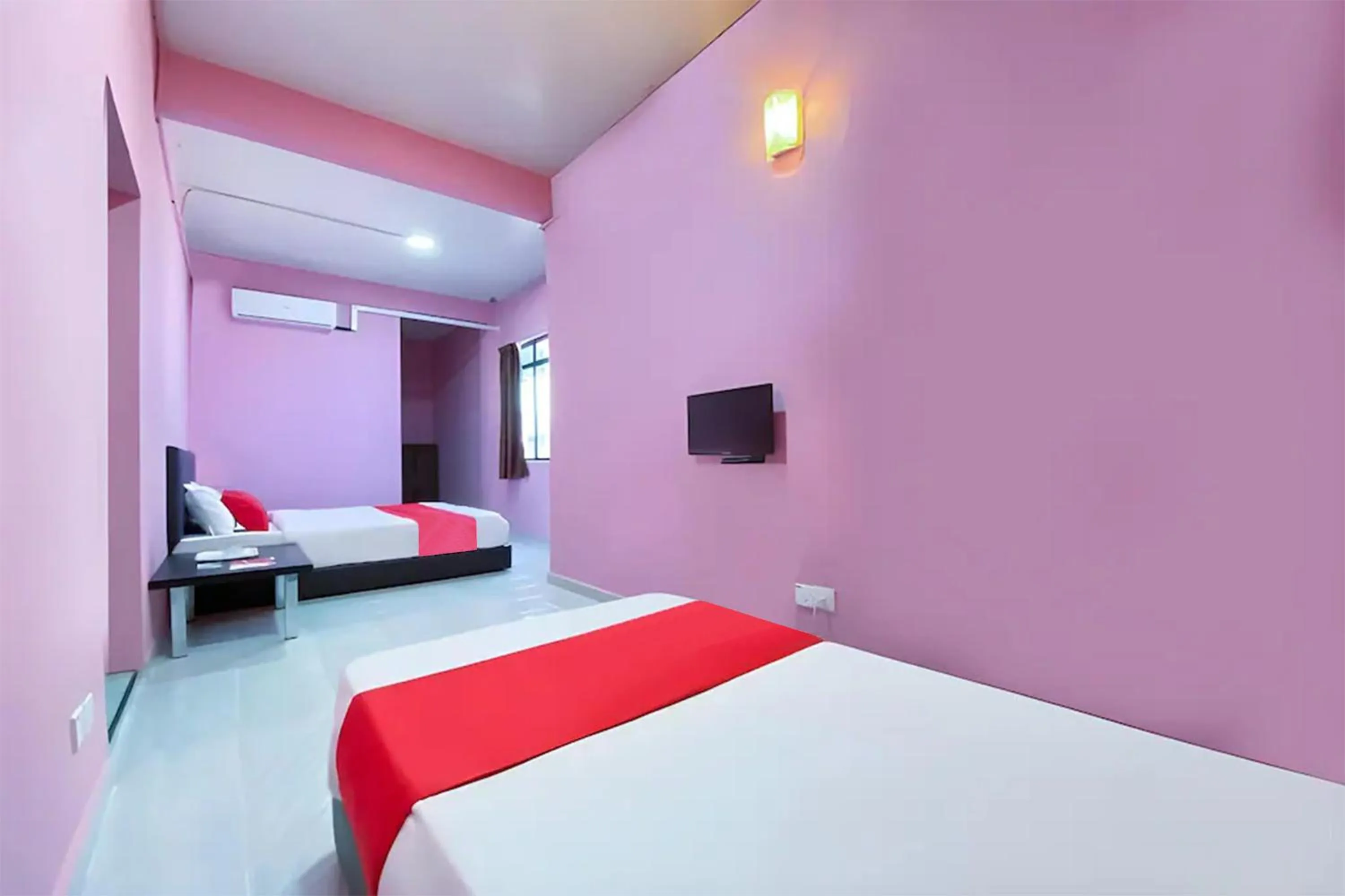 Bed in Coop Hotel Kangar
