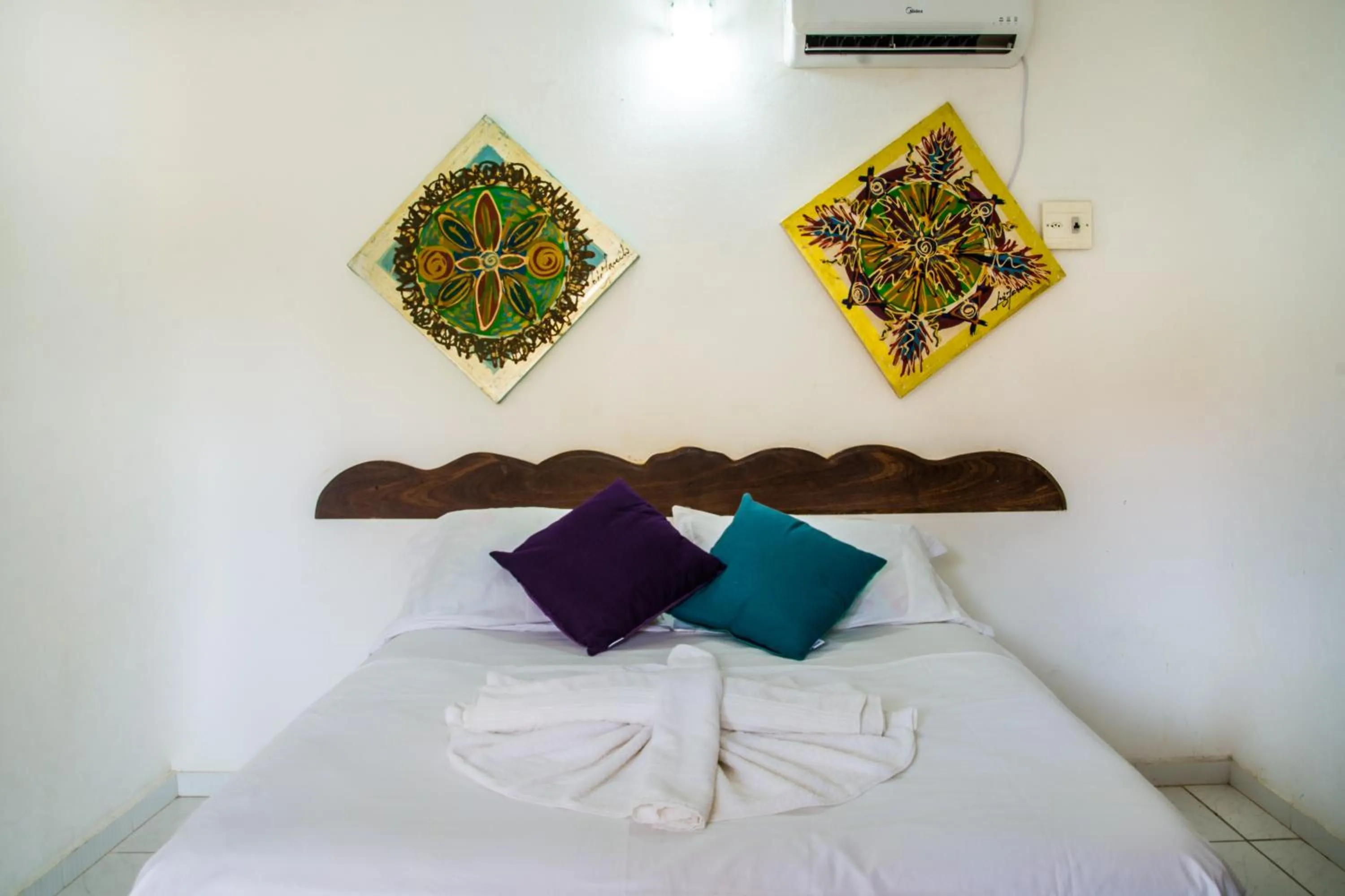 Bed in Pousada Grauçá