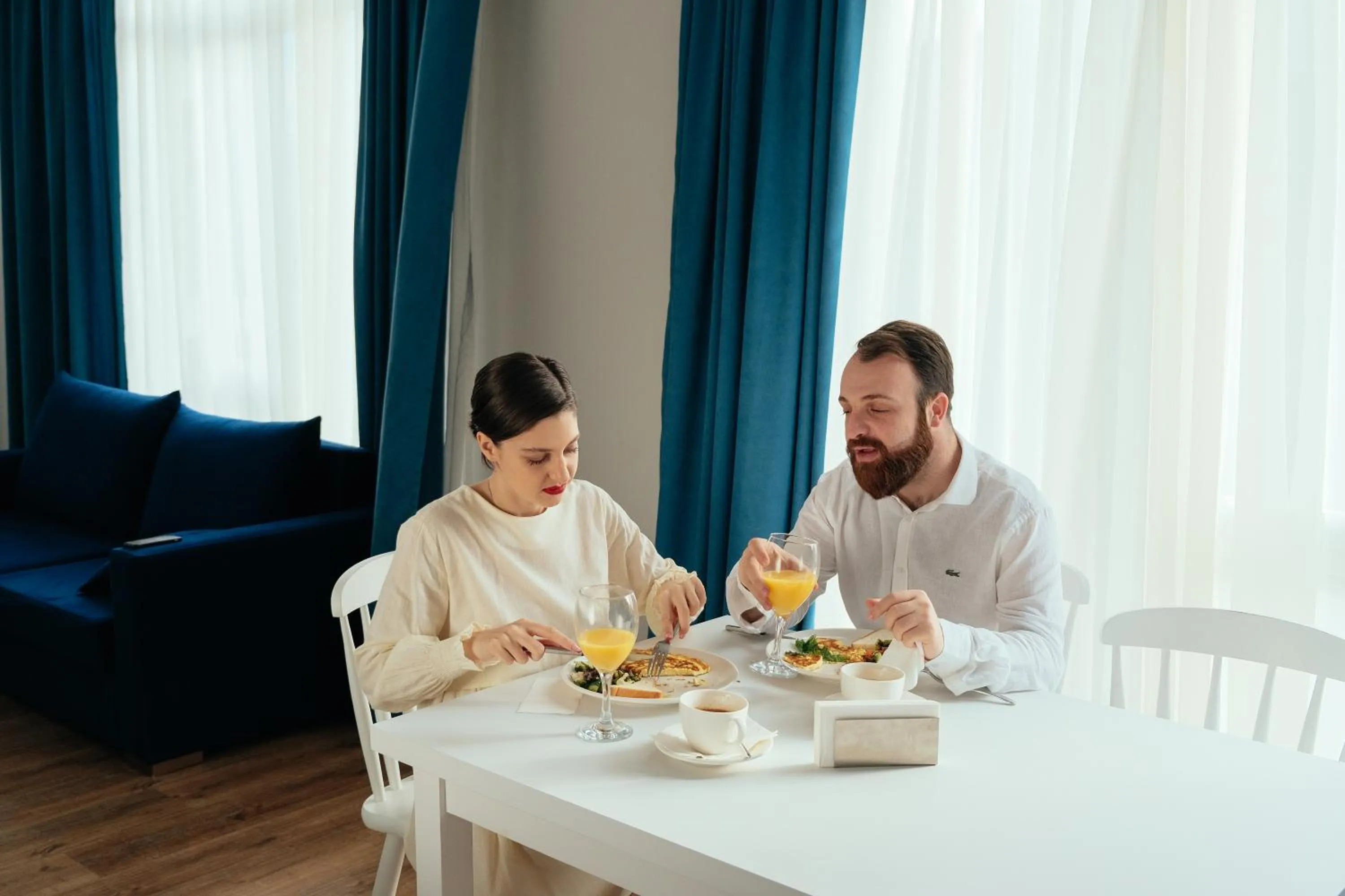 People in White Sails Residential Hotel