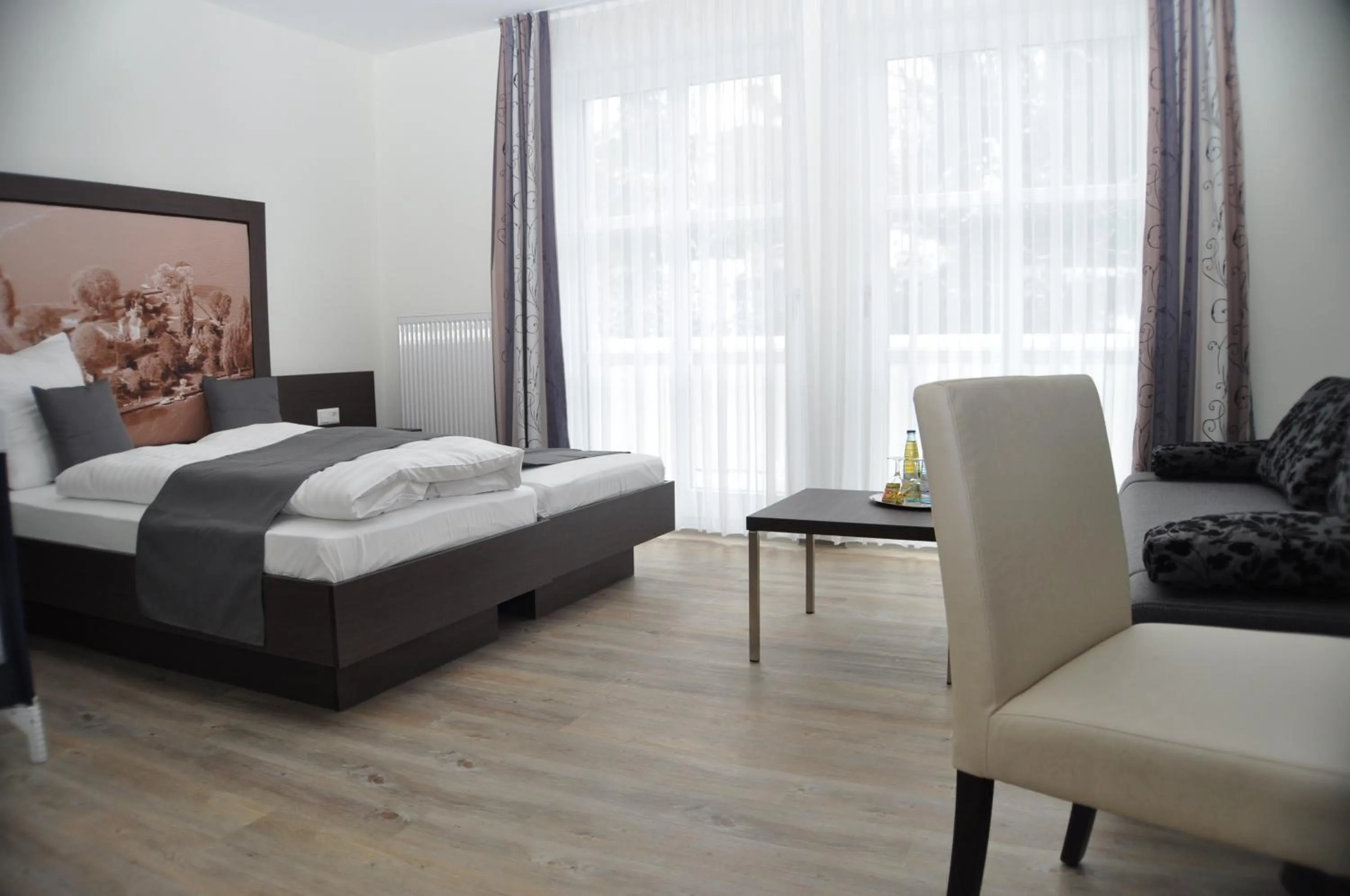 Photo of the whole room, Bed in Hotel & Restaurant Schaumburger Ritter, Rinteln