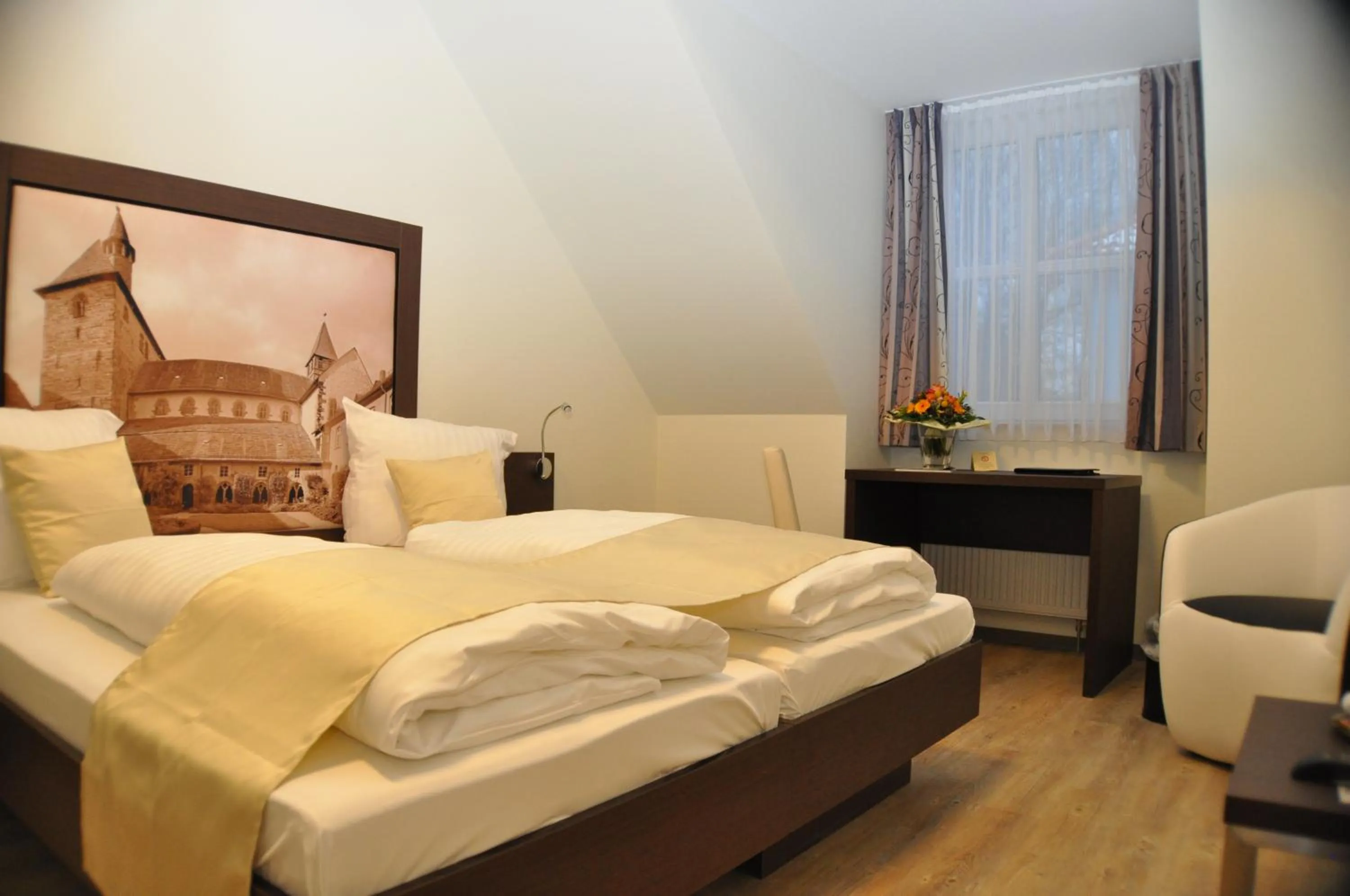 Photo of the whole room, Bed in Hotel & Restaurant Schaumburger Ritter, Rinteln