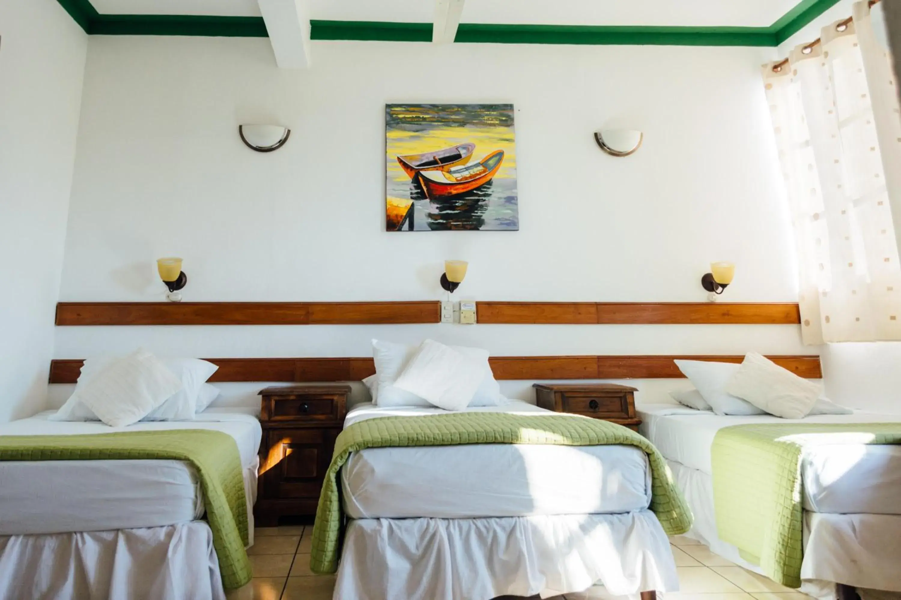 Triple Room in Hotel Casa Amelia Triple Room in Hotel Casa Amelia