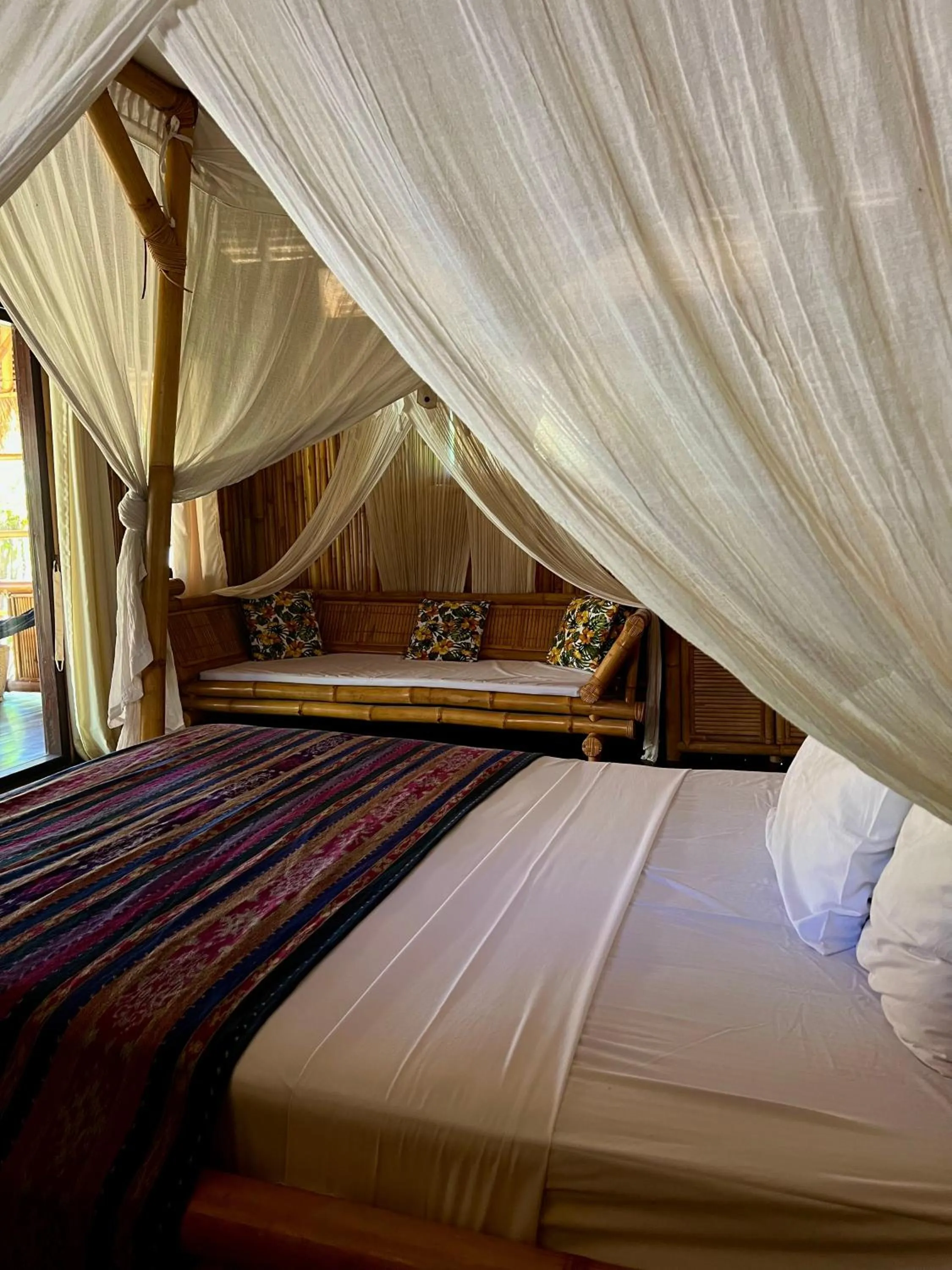 Bed in Rinjani Beach Eco Resort