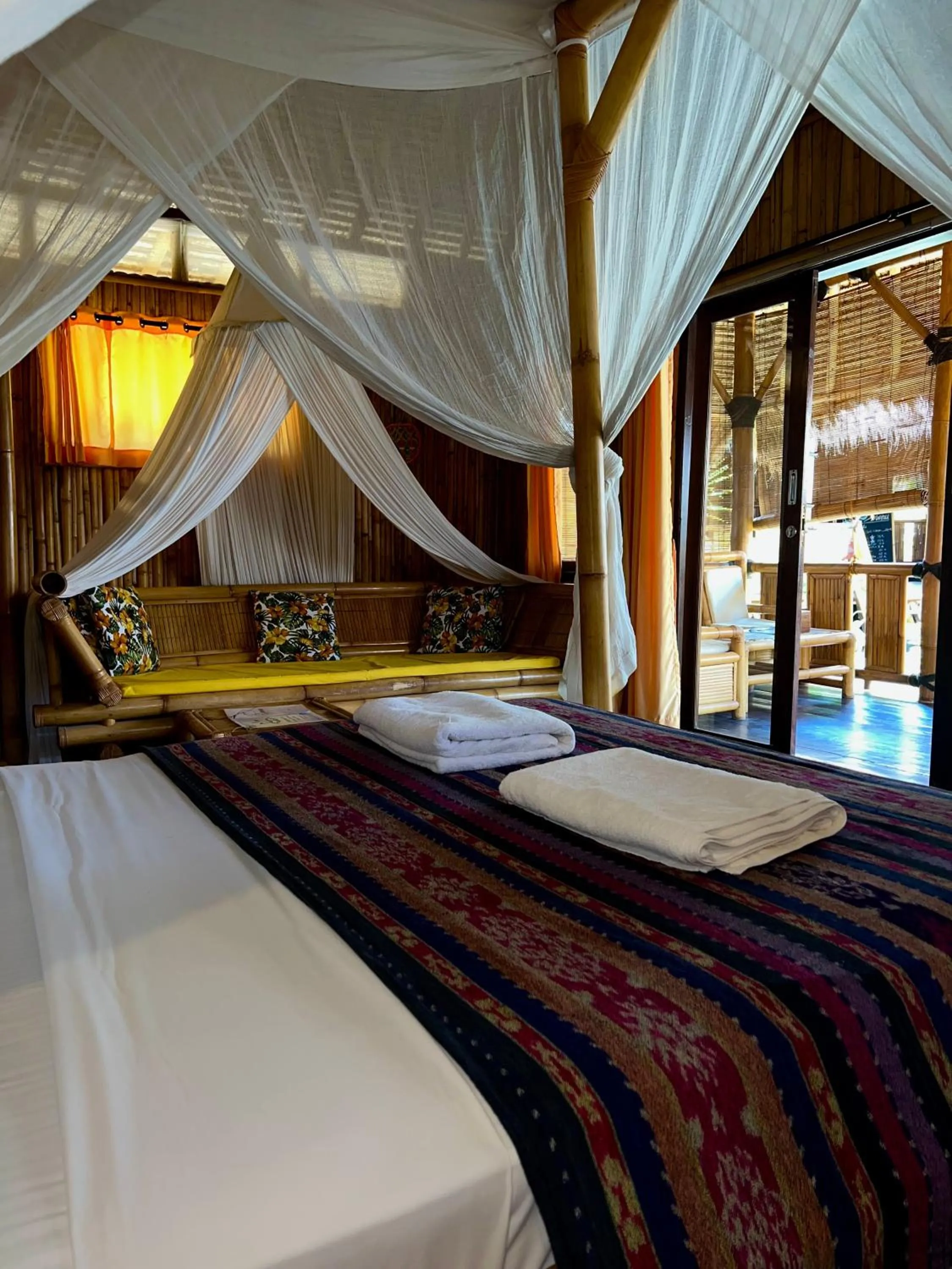 Bed in Rinjani Beach Eco Resort