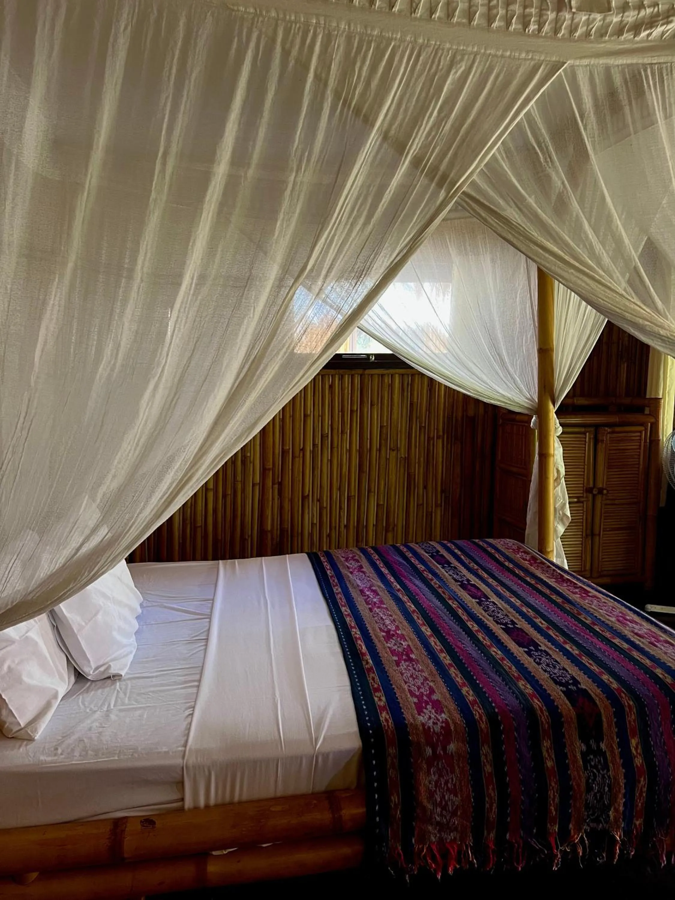 Bed in Rinjani Beach Eco Resort