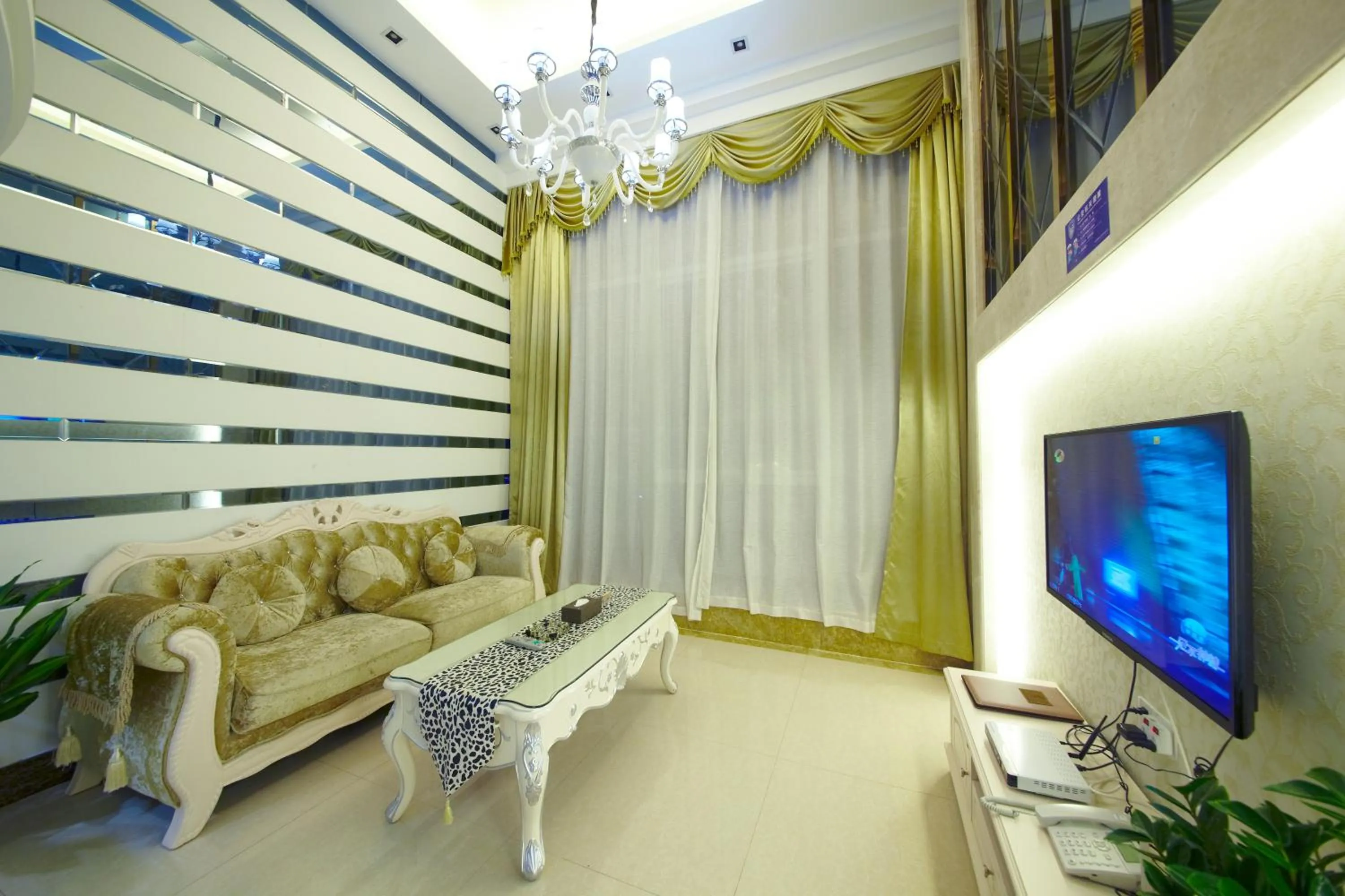 Living room in Louidon Mega Apartment Of Kam Rueng Plaza - Sunshine Apartment