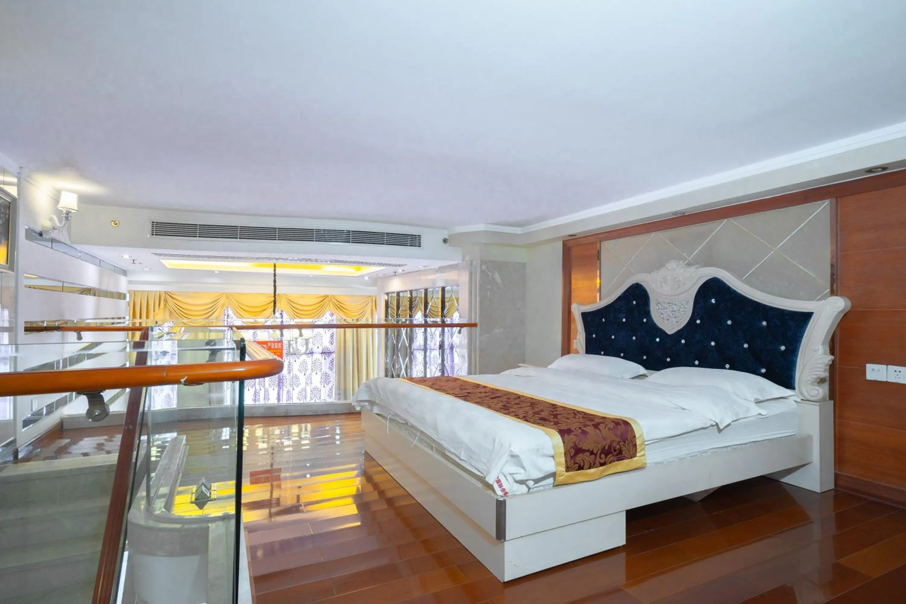 Bed in Louidon Mega Apartment Of Kam Rueng Plaza - Sunshine Apartment