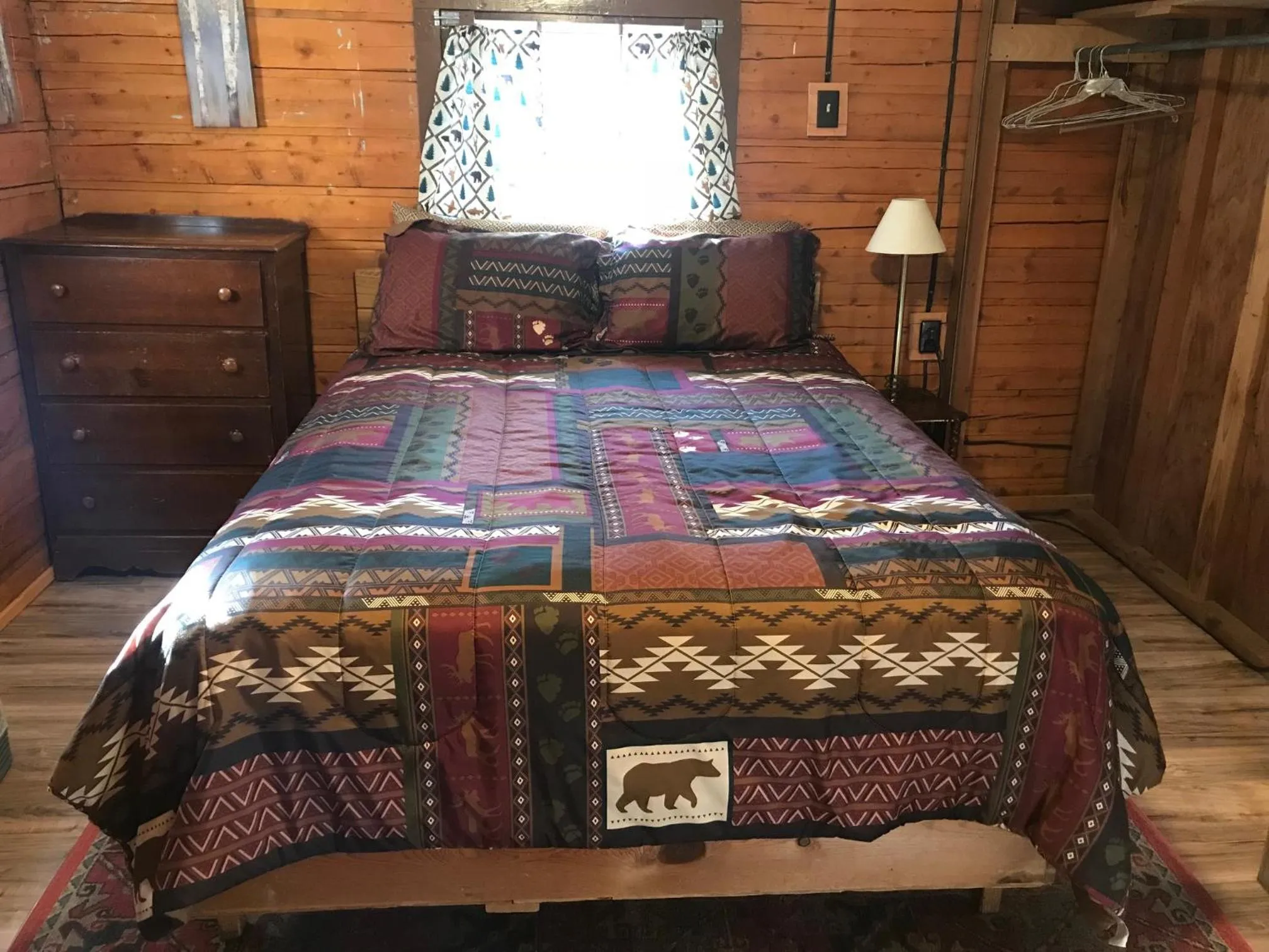 Bed in Grandview Cabins & RV Resort