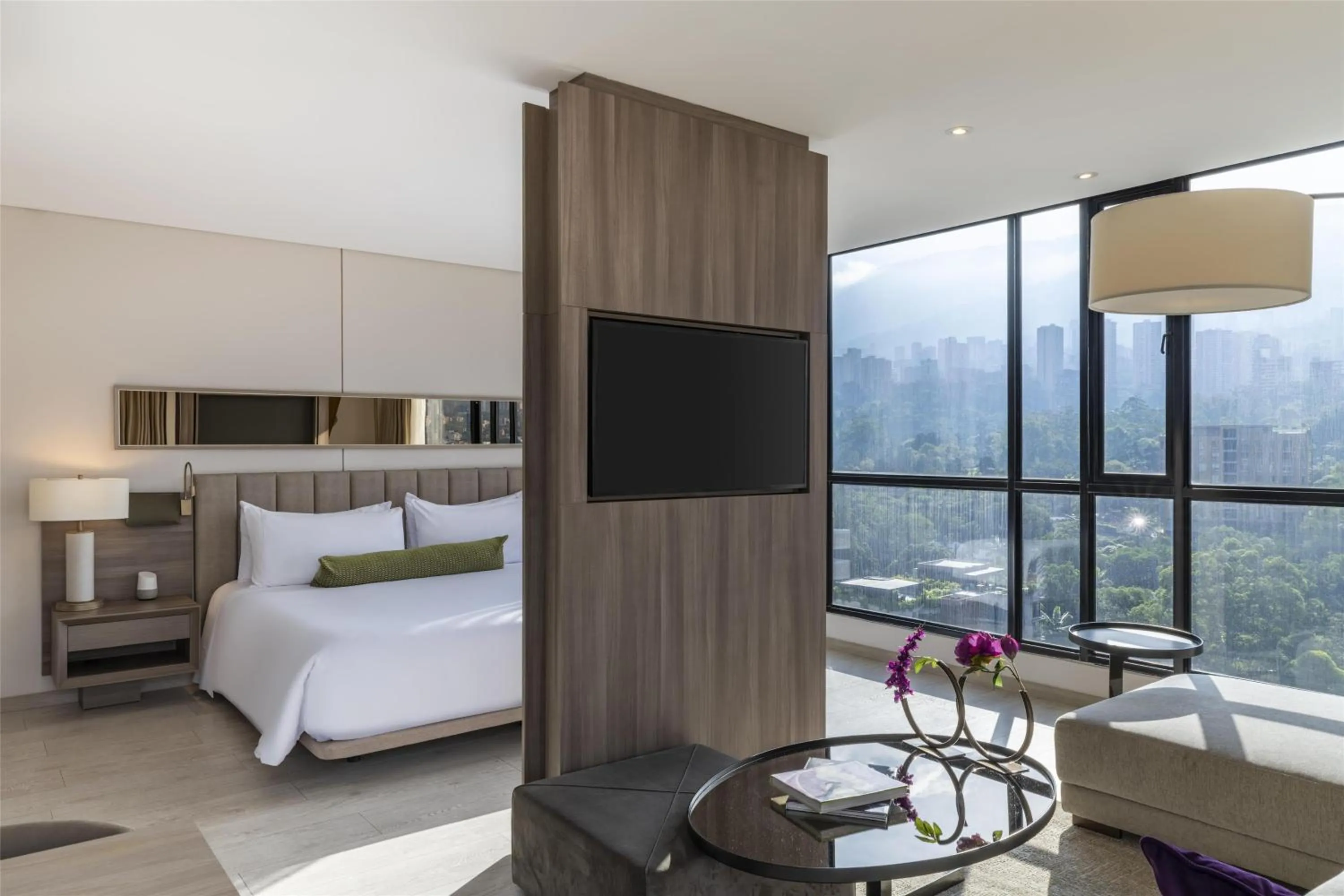 Living room, Bed in York Medellin, Curio Collection by Hilton
