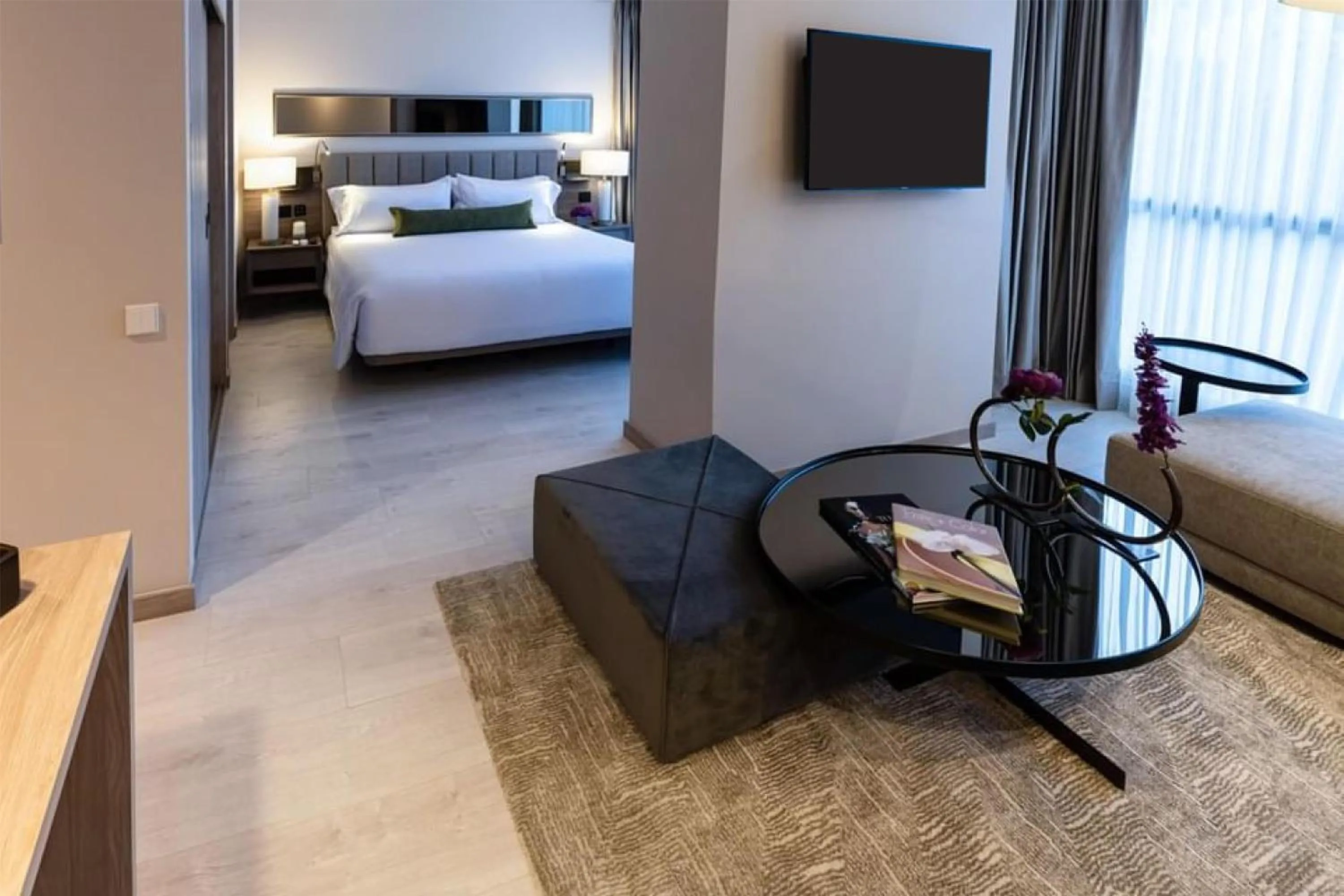 Living room, Bed in York Medellin, Curio Collection by Hilton